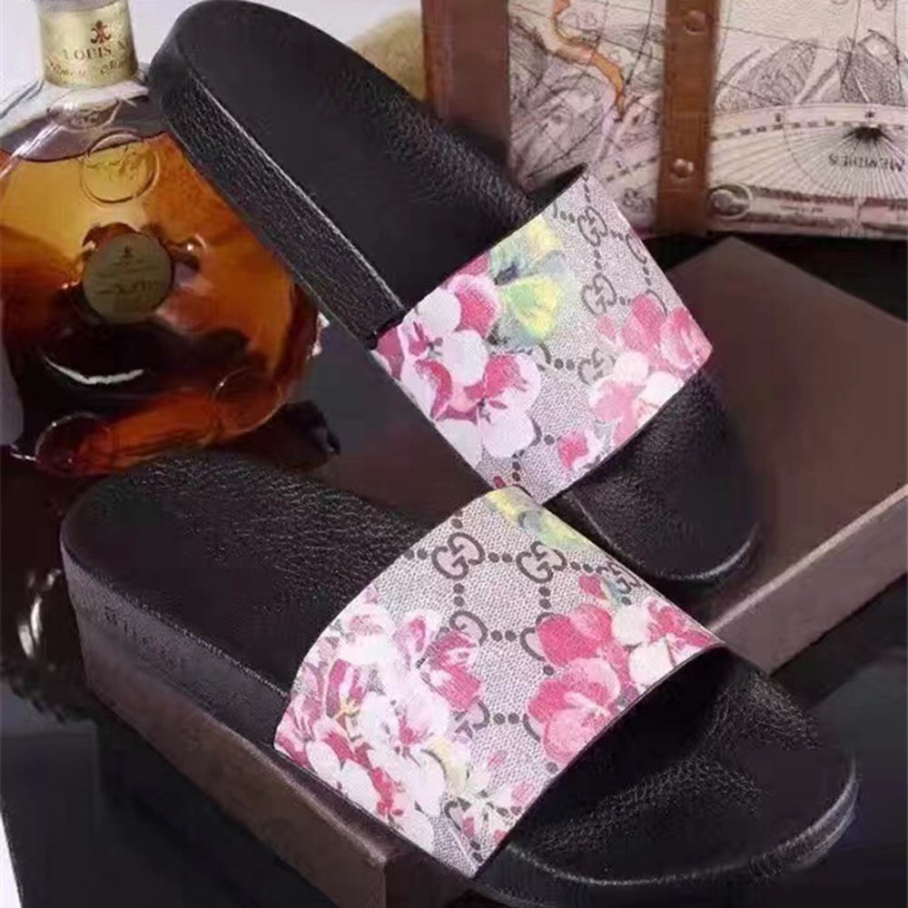 Gucci Vogel- und Blumen-Flip-Flops - EUR FASHION