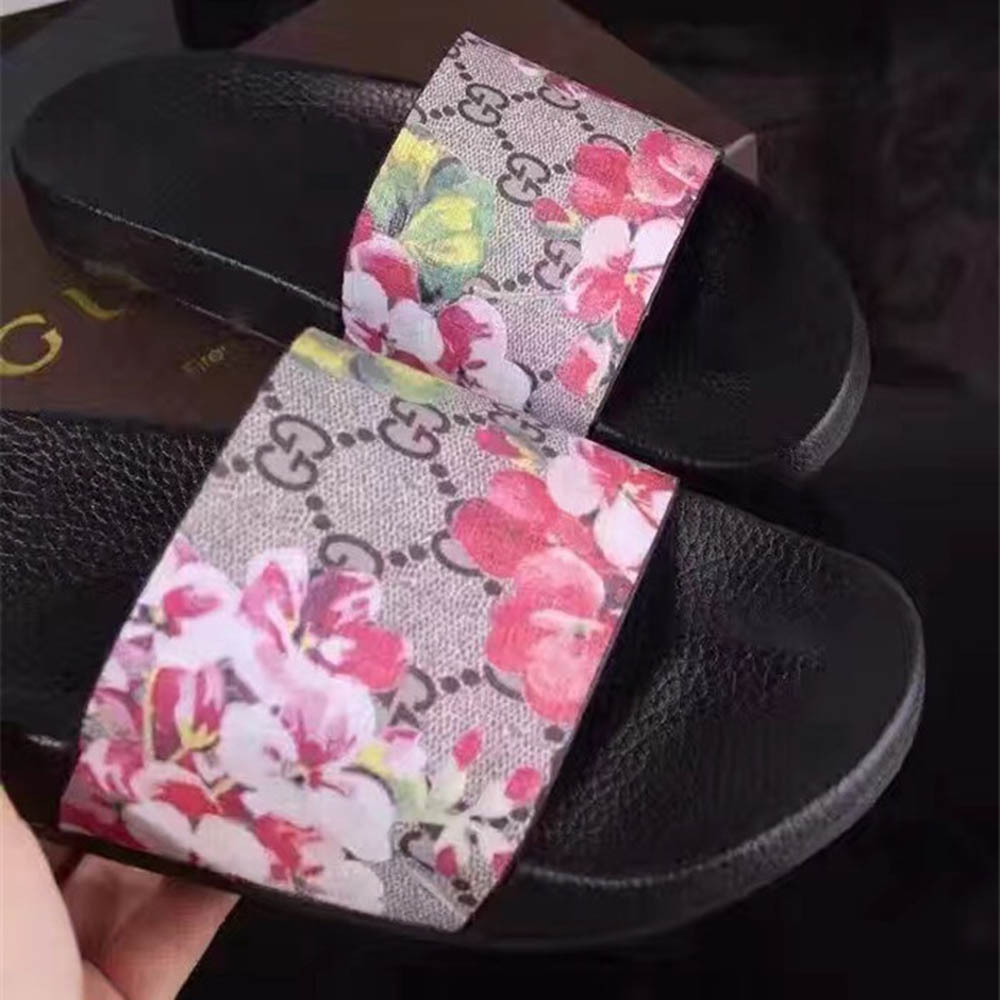 Gucci Vogel- und Blumen-Flip-Flops - EUR FASHION