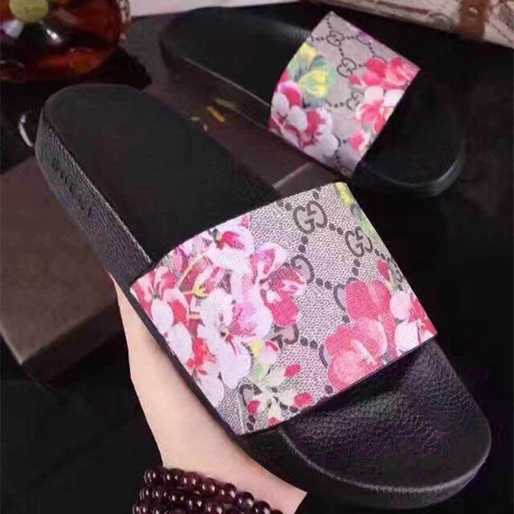 Gucci Vogel- und Blumen-Flip-Flops - EUR FASHION