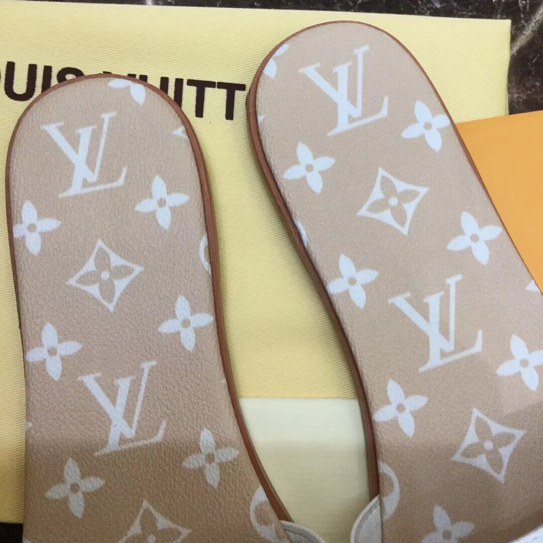 Flache Mules „Lock It“ von Louis Vuitton in Weiß/Mokkabraun - EUR FASHION