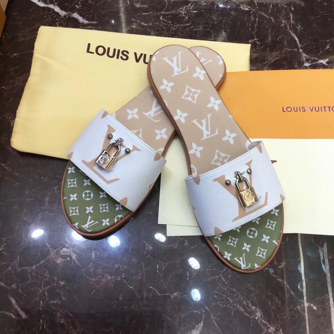 Flache Mules „Lock It“ von Louis Vuitton in Weiß/Mokkabraun - EUR FASHION