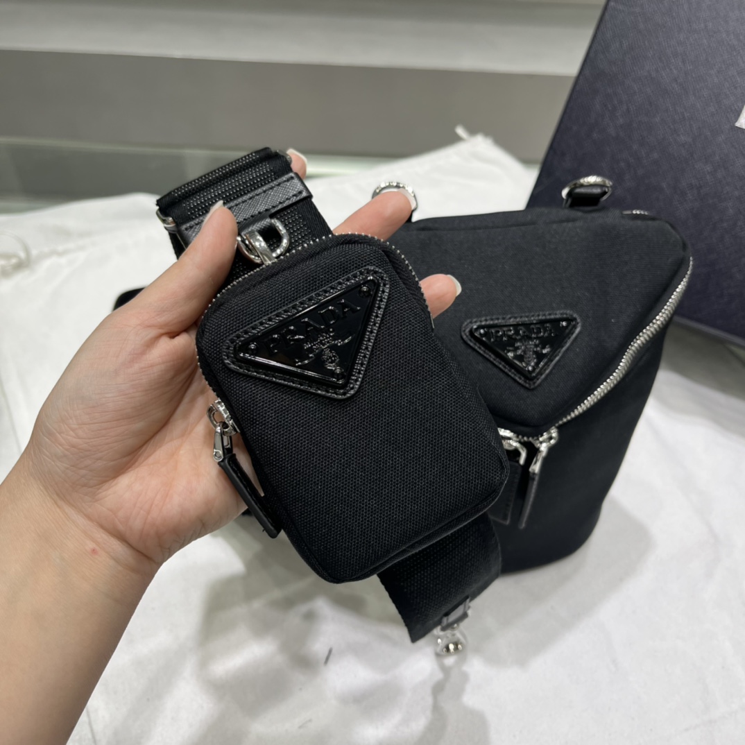Prada Umhängetasche aus Re-Nylon und Leder - EUR FASHION