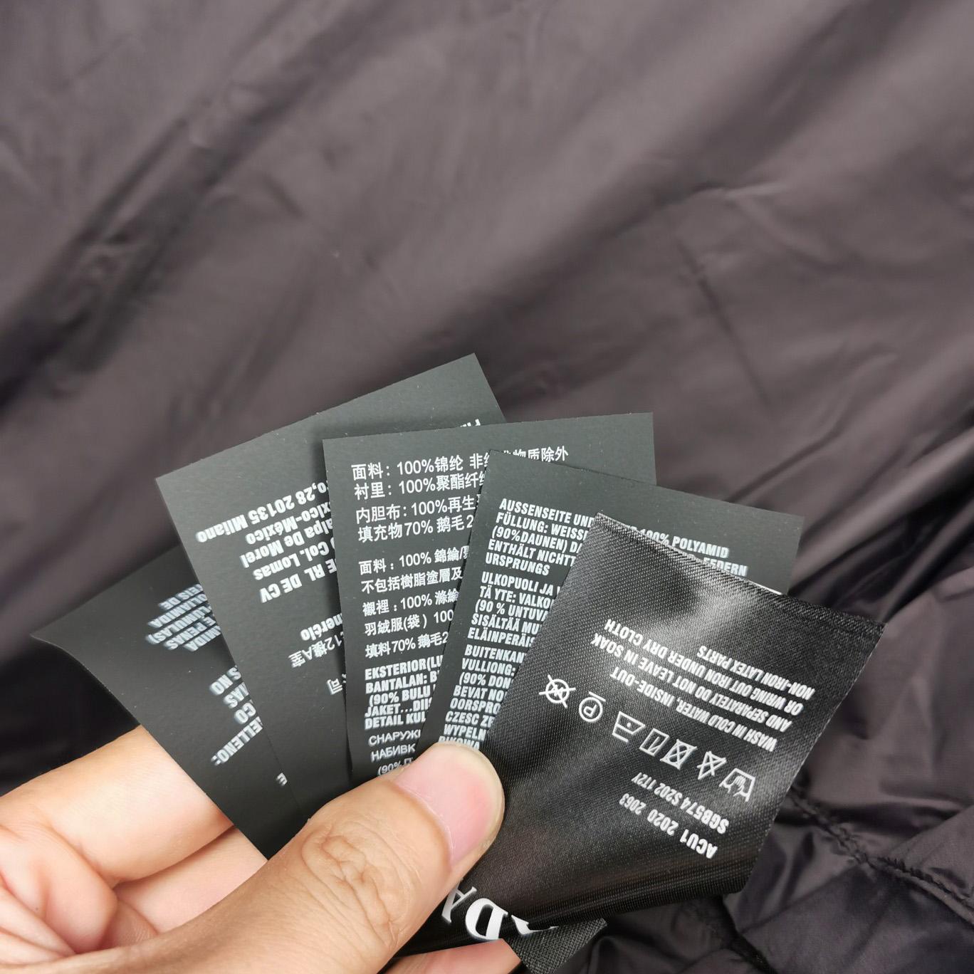 Kurz geschnittene Daunenjacke aus technischem Nylon von Prada - EUR FASHION