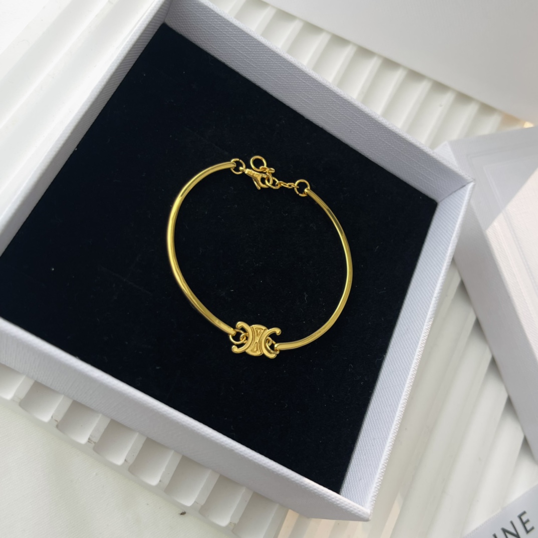 Celine Triomphe Gelenkarmband aus Messing mit Goldfinish - EUR FASHION