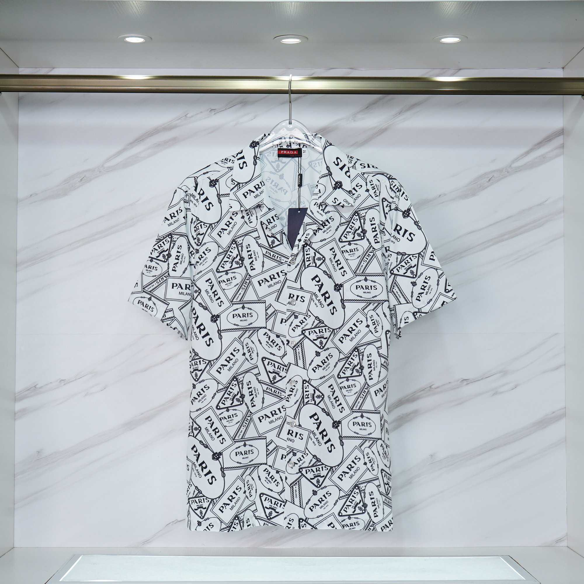 Kurzärmliges Hemd und Shorts mit Prada-Logo - EUR FASHION