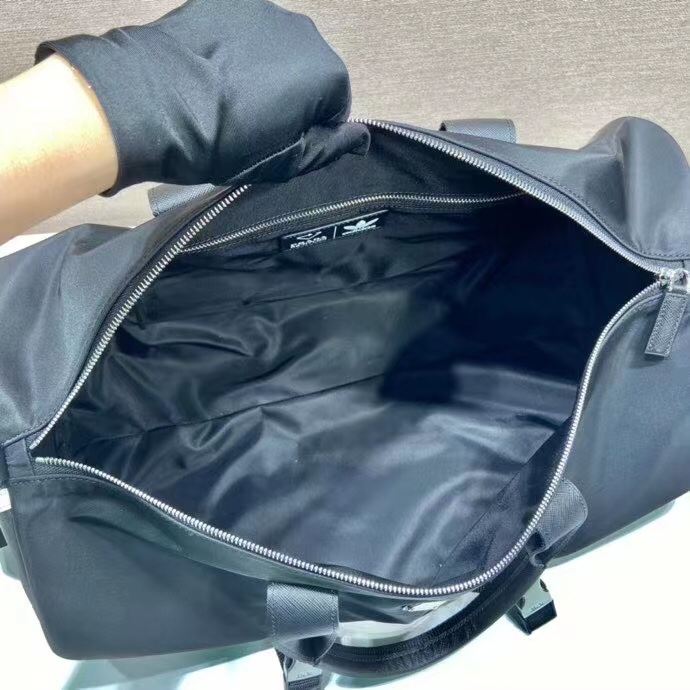 Prada-Reisetasche aus Nylon und Saffiano-Leder - EUR FASHION