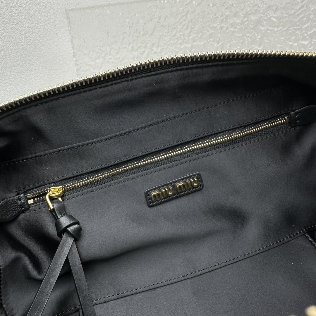 Miu Miu Ledertasche mit Henkel - EUR FASHION