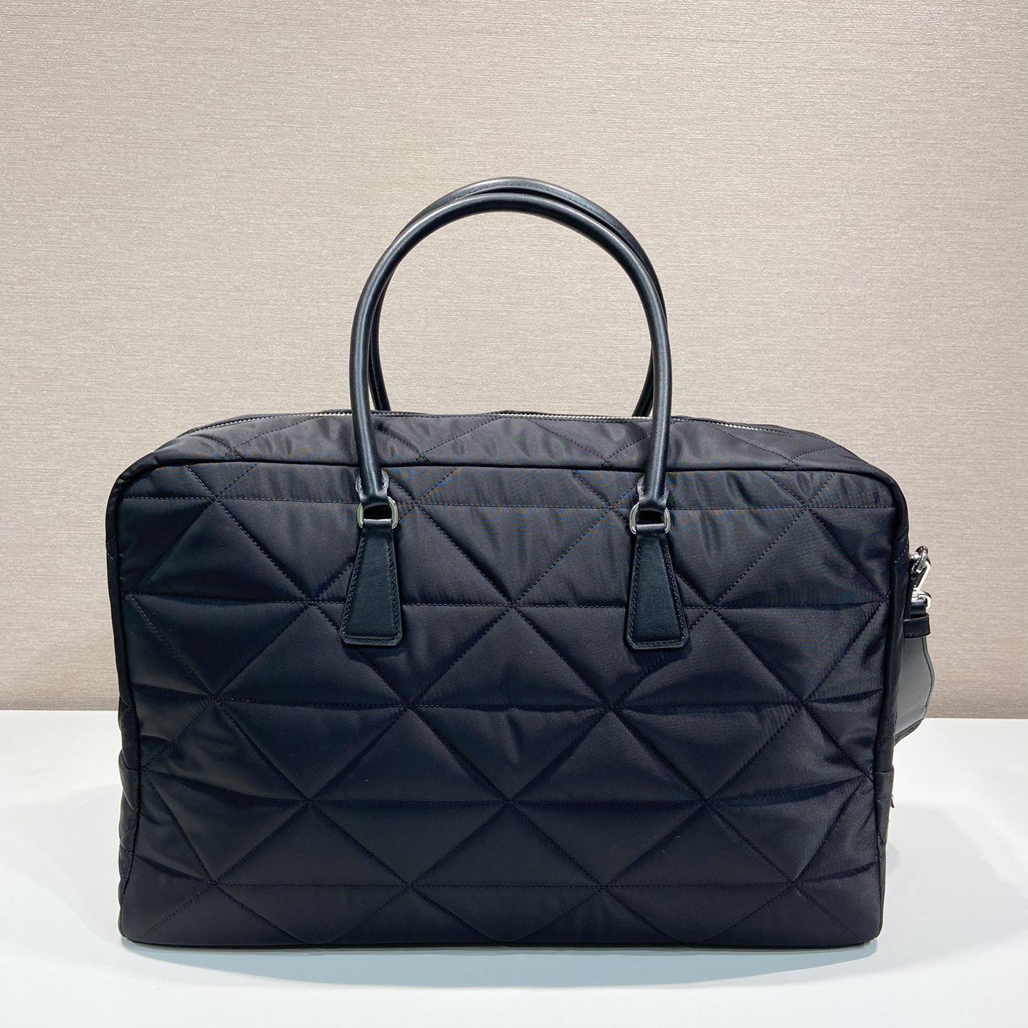 Prada gesteppte Re-Nylon-Reisetasche - EUR FASHION