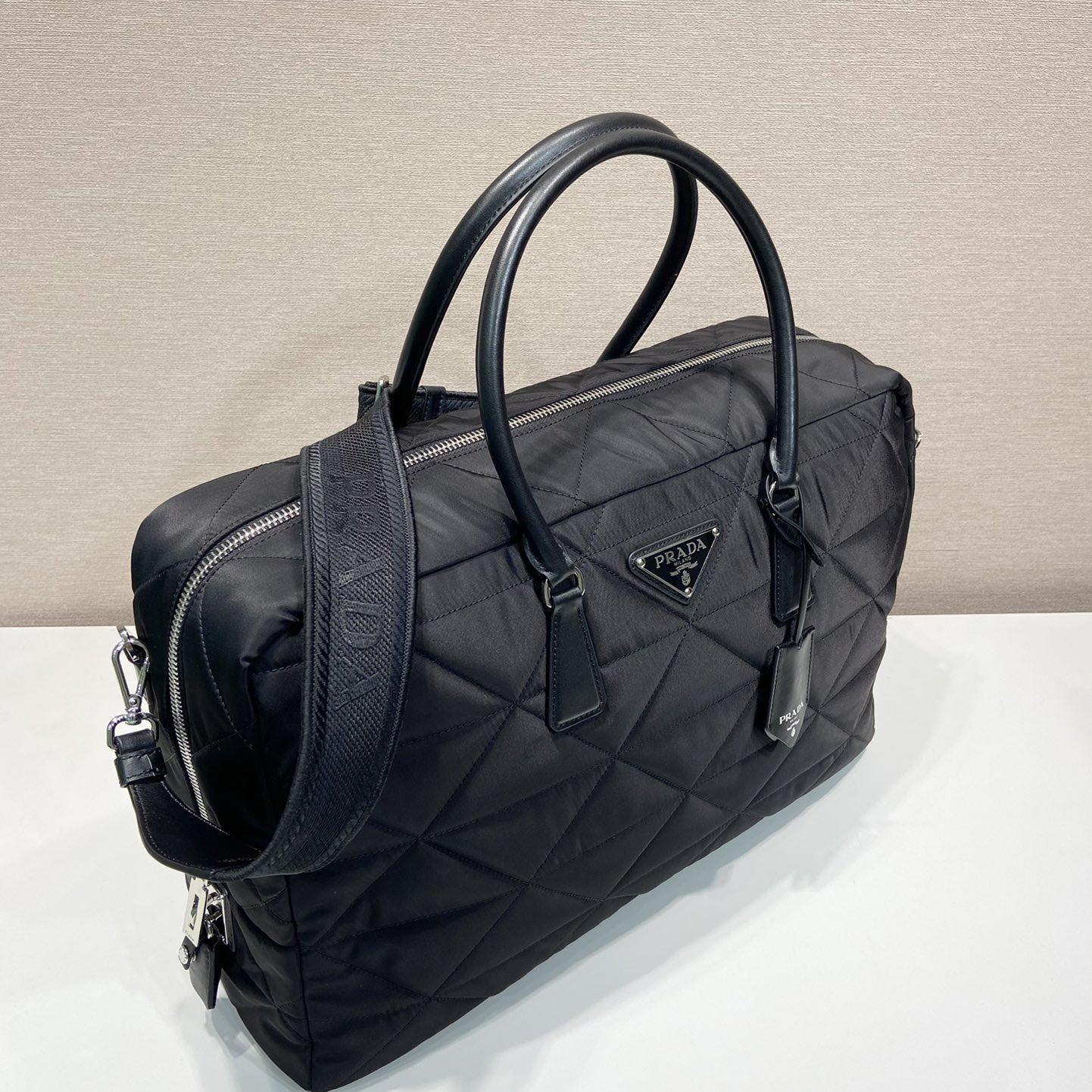 Prada gesteppte Re-Nylon-Reisetasche - EUR FASHION