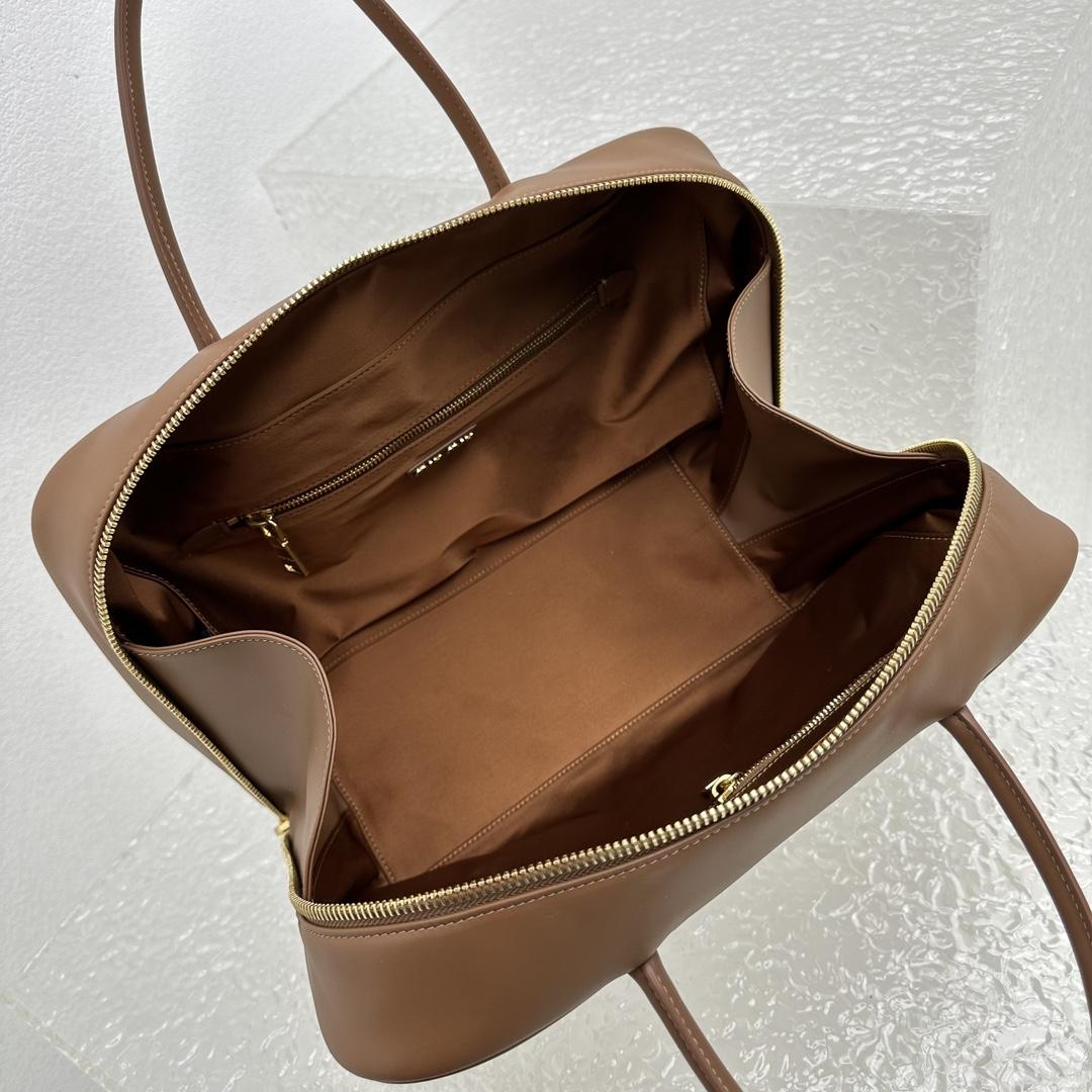 Miu Miu Ledertasche mit Henkel - EUR FASHION