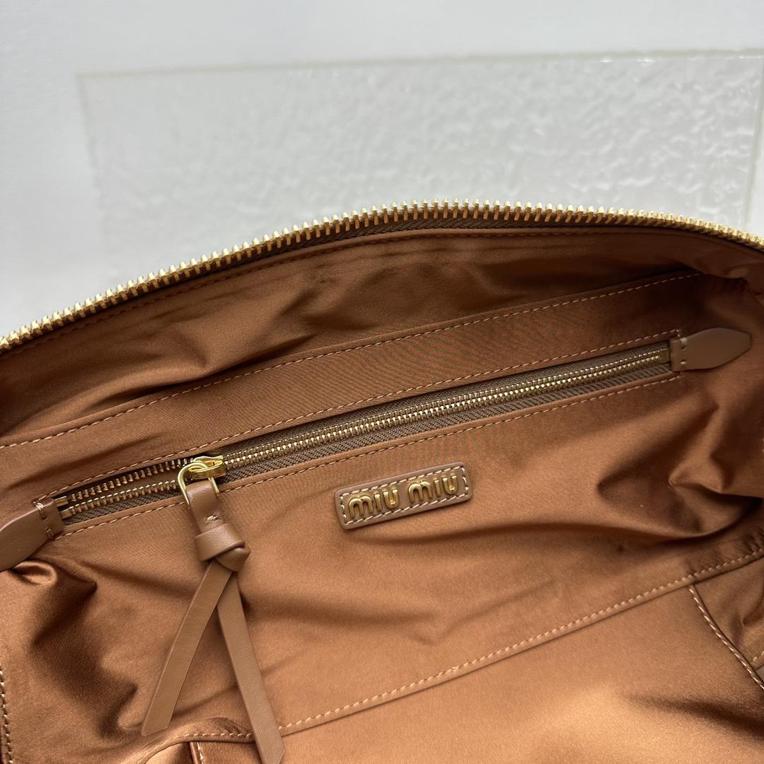 Miu Miu Ledertasche mit Henkel - EUR FASHION