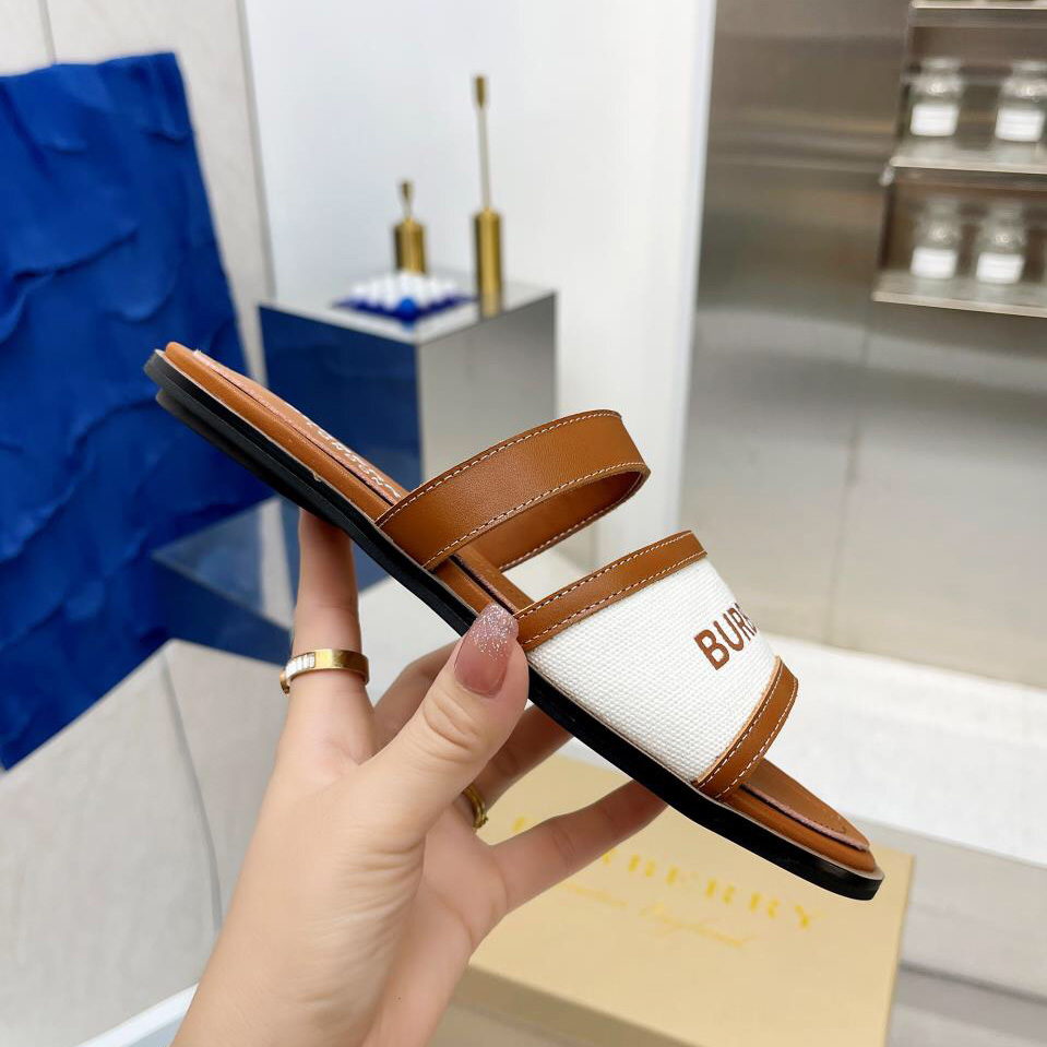 Burberry Pantoletten aus Leder und Baumwoll-Canvas mit Logo-Applikation für Damen in Braun - EUR FASHION