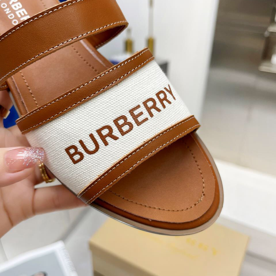 Burberry Pantoletten aus Leder und Baumwoll-Canvas mit Logo-Applikation für Damen in Braun - EUR FASHION