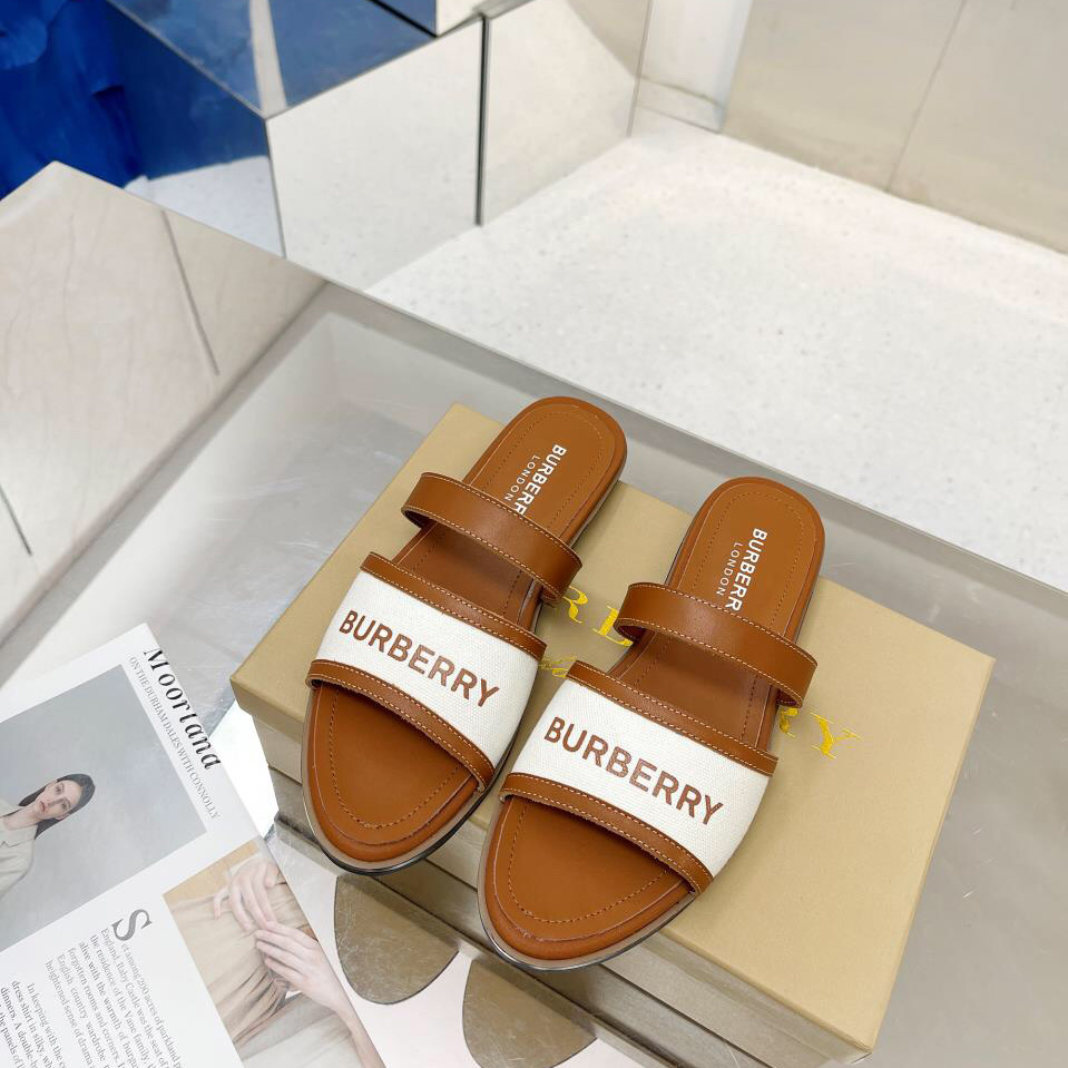 Burberry Pantoletten aus Leder und Baumwoll-Canvas mit Logo-Applikation für Damen in Braun - EUR FASHION