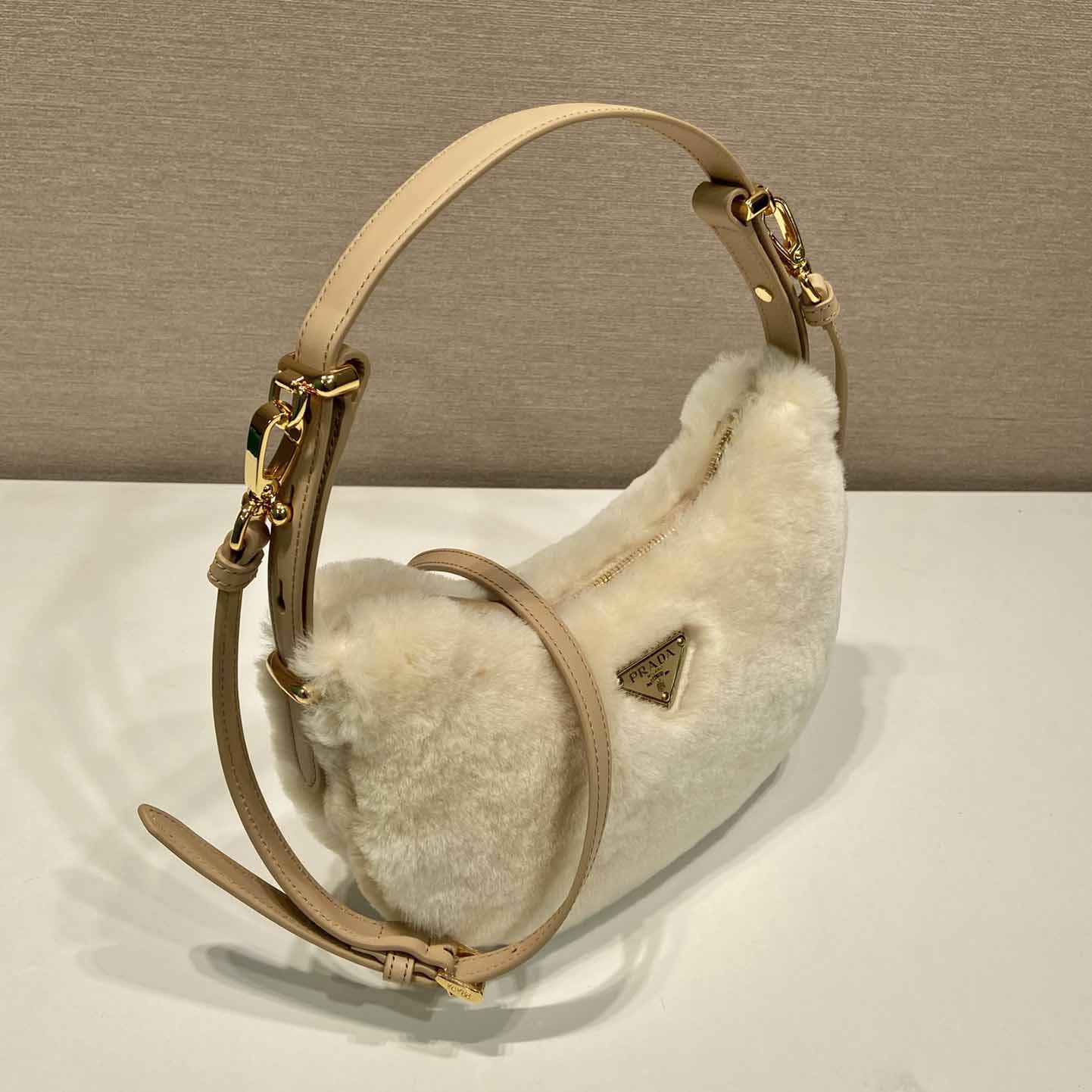 Prada Arqué Shearling And Leather Shoulder Bag - EUR FASHION