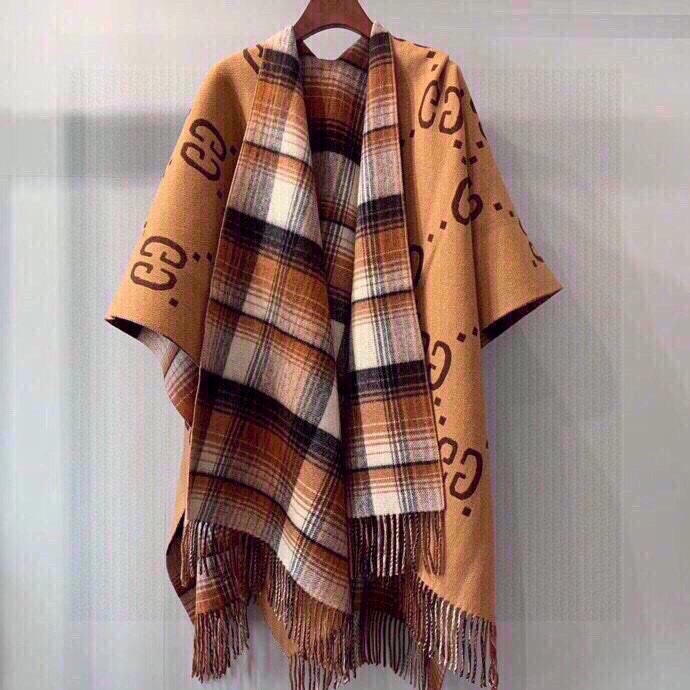 Gucci Wendeponcho<br>
 - EUR FASHION