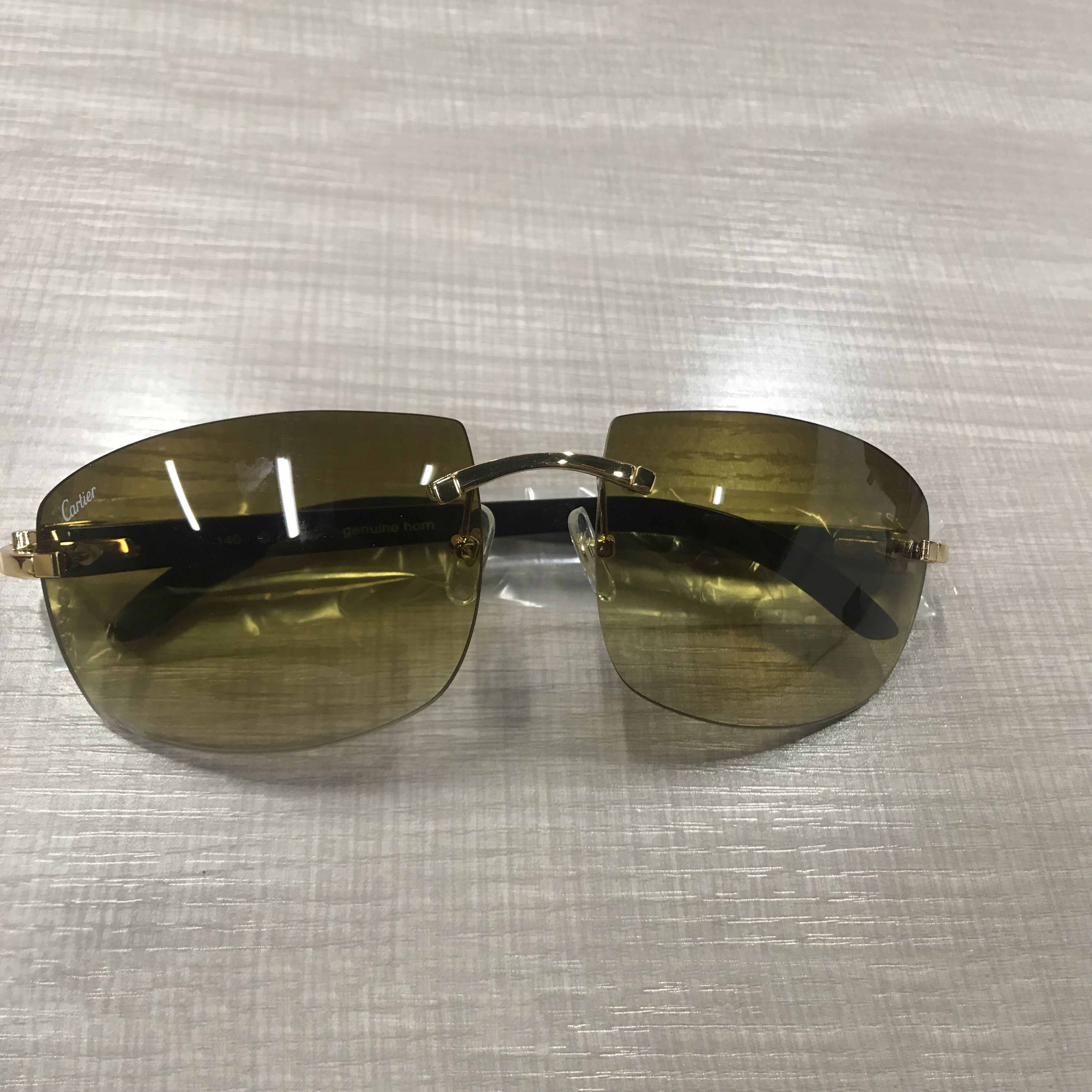 Cartier 4189705 White Mix Black Buffalo Sonnenbrille in Gold - EUR FASHION