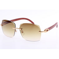 Cartier 8300818 Holzsonnenbrille mit gravierten Gläsern in Goldbraun - EUR FASHION