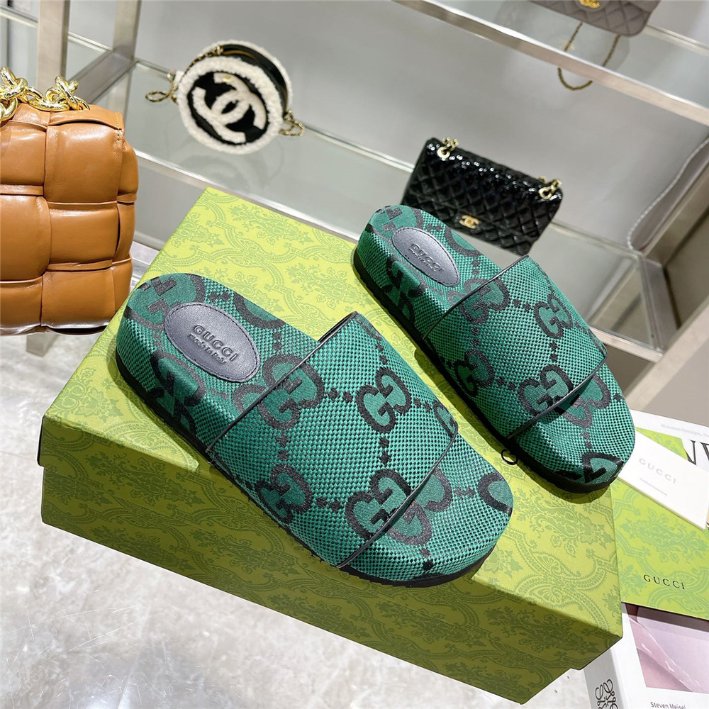 Grüne Gucci-Slides mit GG-Logo - EUR FASHION