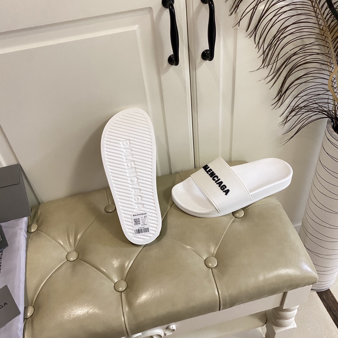 Balenciaga Pool Slide Sandale aus weißem, glattem Gummi mit schwarzem 3D-Balenciaga-Logo - EUR FASHION