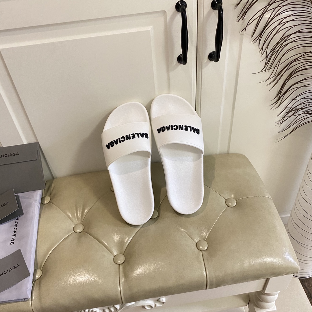 Balenciaga Pool Slide Sandale aus weißem, glattem Gummi mit schwarzem 3D-Balenciaga-Logo - EUR FASHION
