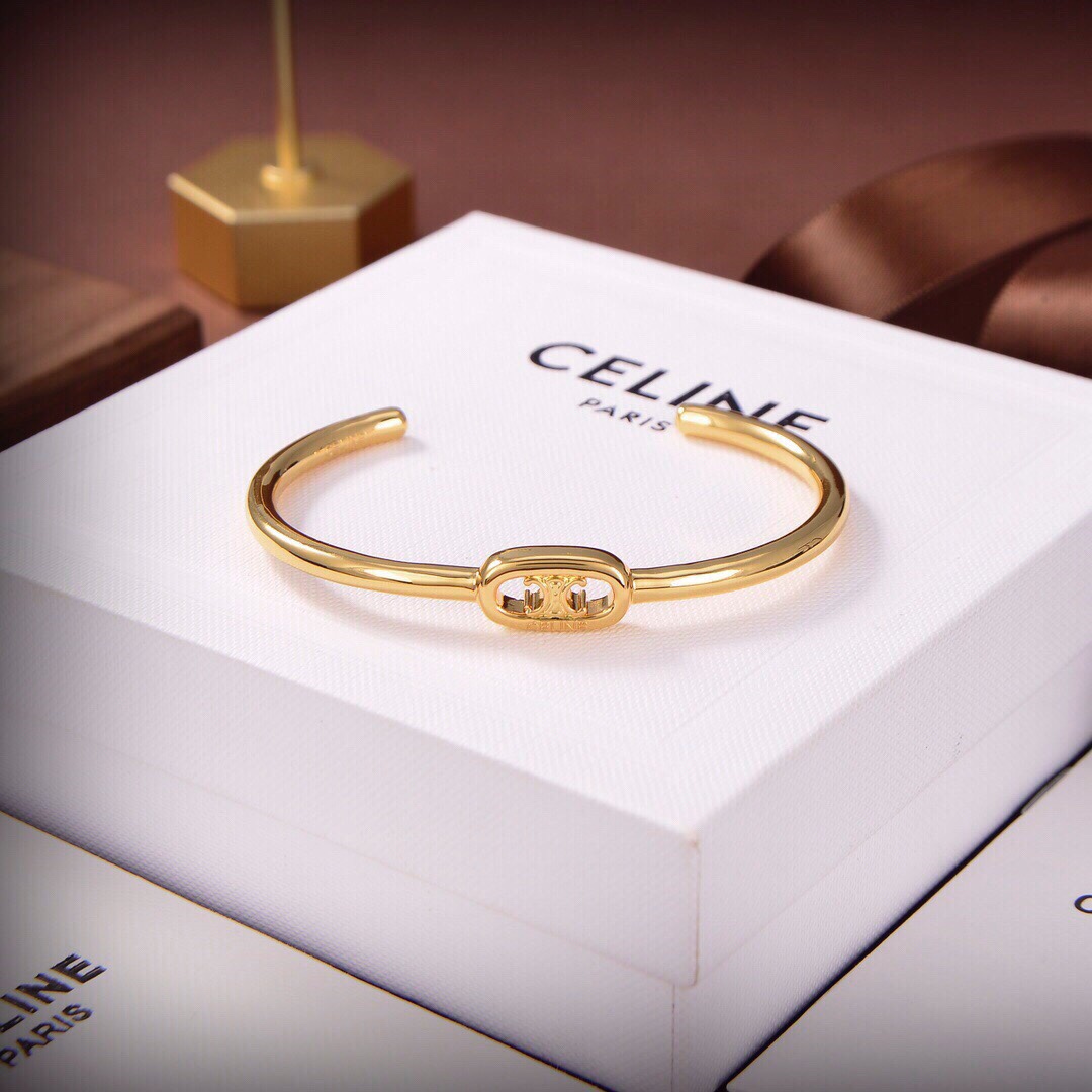 Celine Maillon Triomphe Dünne Manschette aus Messing mit Goldfinish - EUR FASHION
