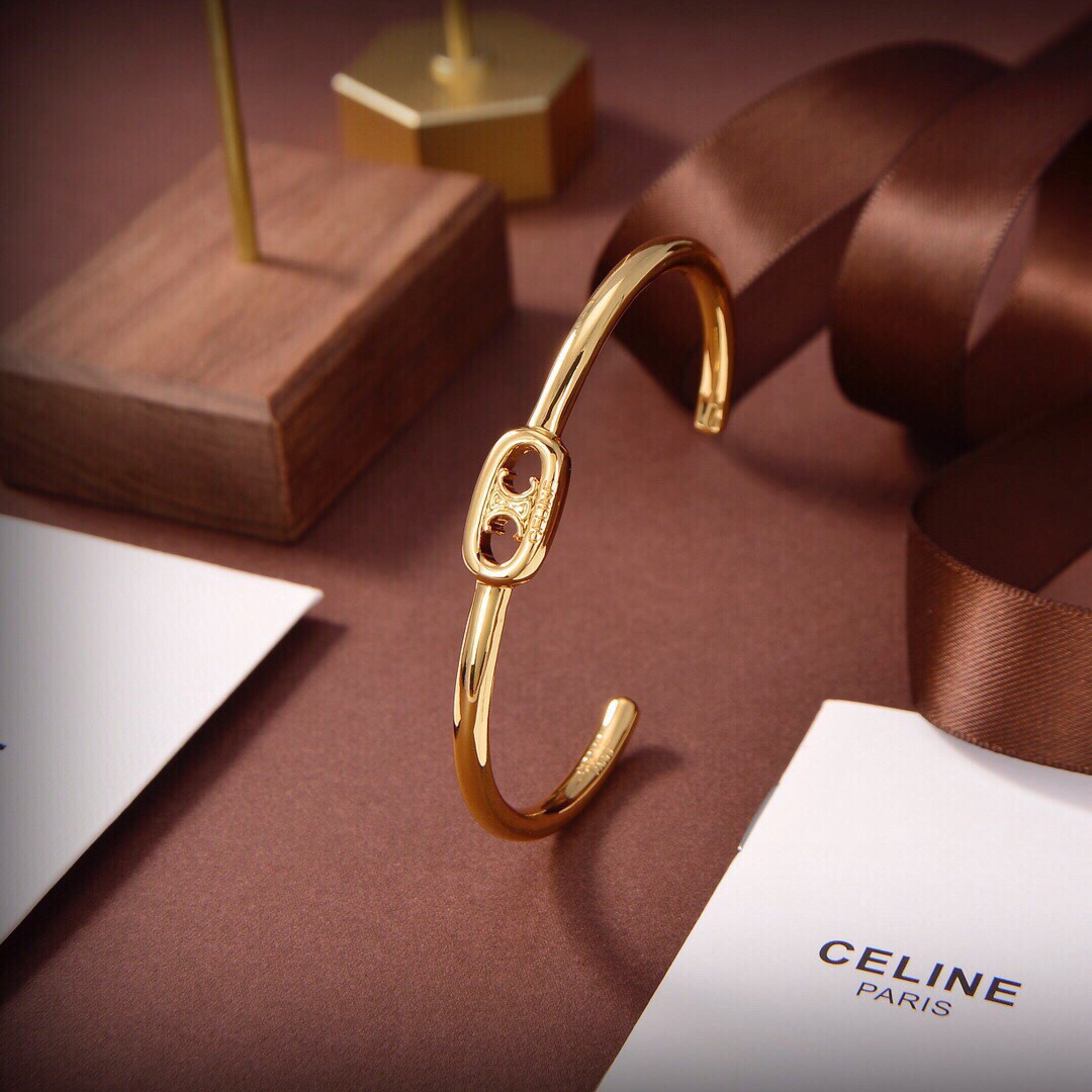 Celine Maillon Triomphe Dünne Manschette aus Messing mit Goldfinish - EUR FASHION