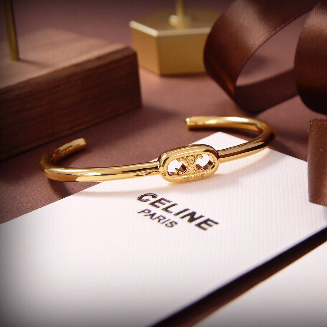 Celine Maillon Triomphe Dünne Manschette aus Messing mit Goldfinish - EUR FASHION