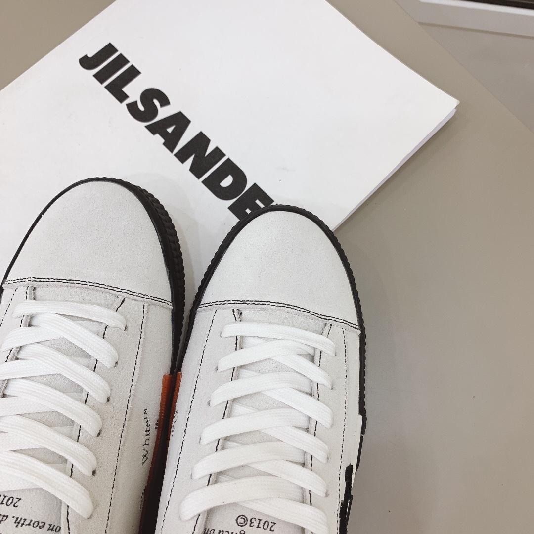 Off-White-Sneakers aus vulkanisiertem Canvas in Weiß und Schwarz - EUR FASHION