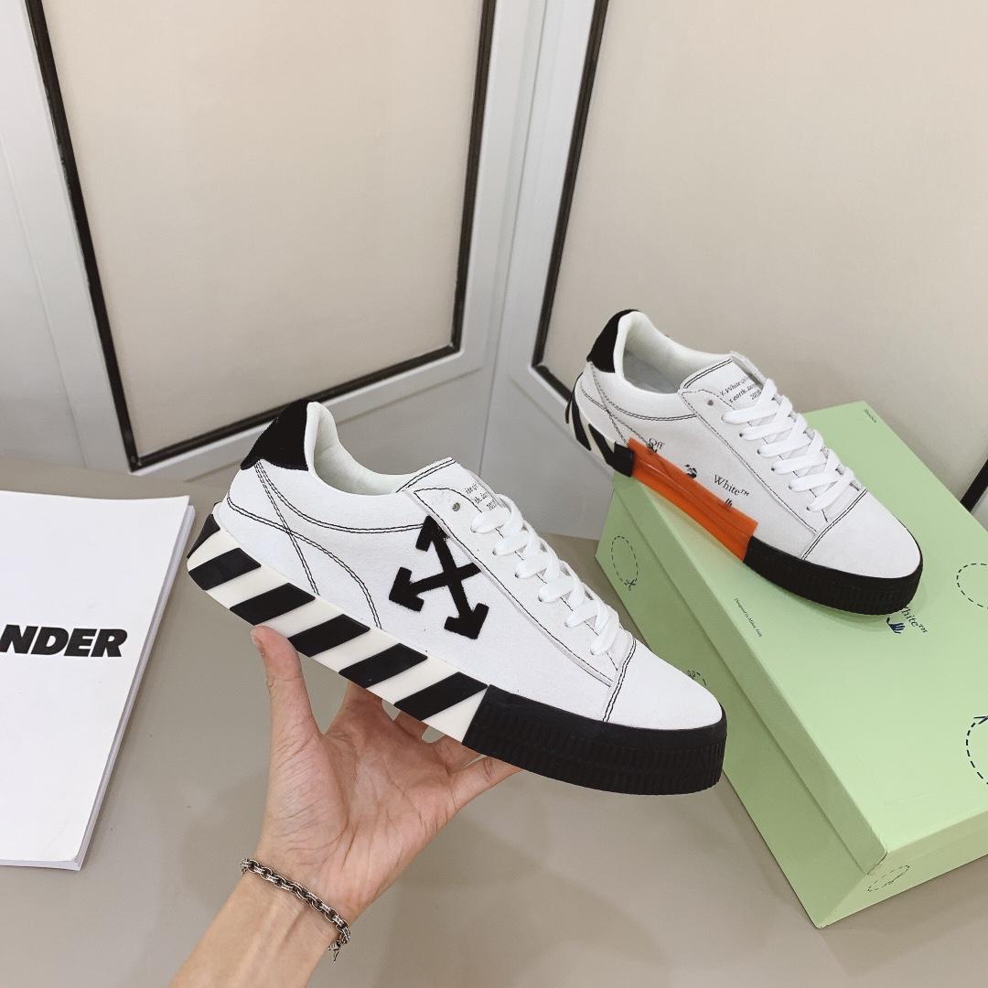 Off-White-Sneakers aus vulkanisiertem Canvas in Weiß und Schwarz - EUR FASHION