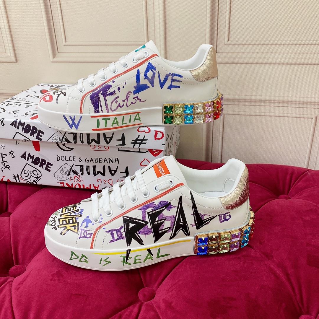 Dolce & Gabbana Portofino-Sneaker aus Kalbsleder mit Stickerei und Schriftzug - EUR FASHION