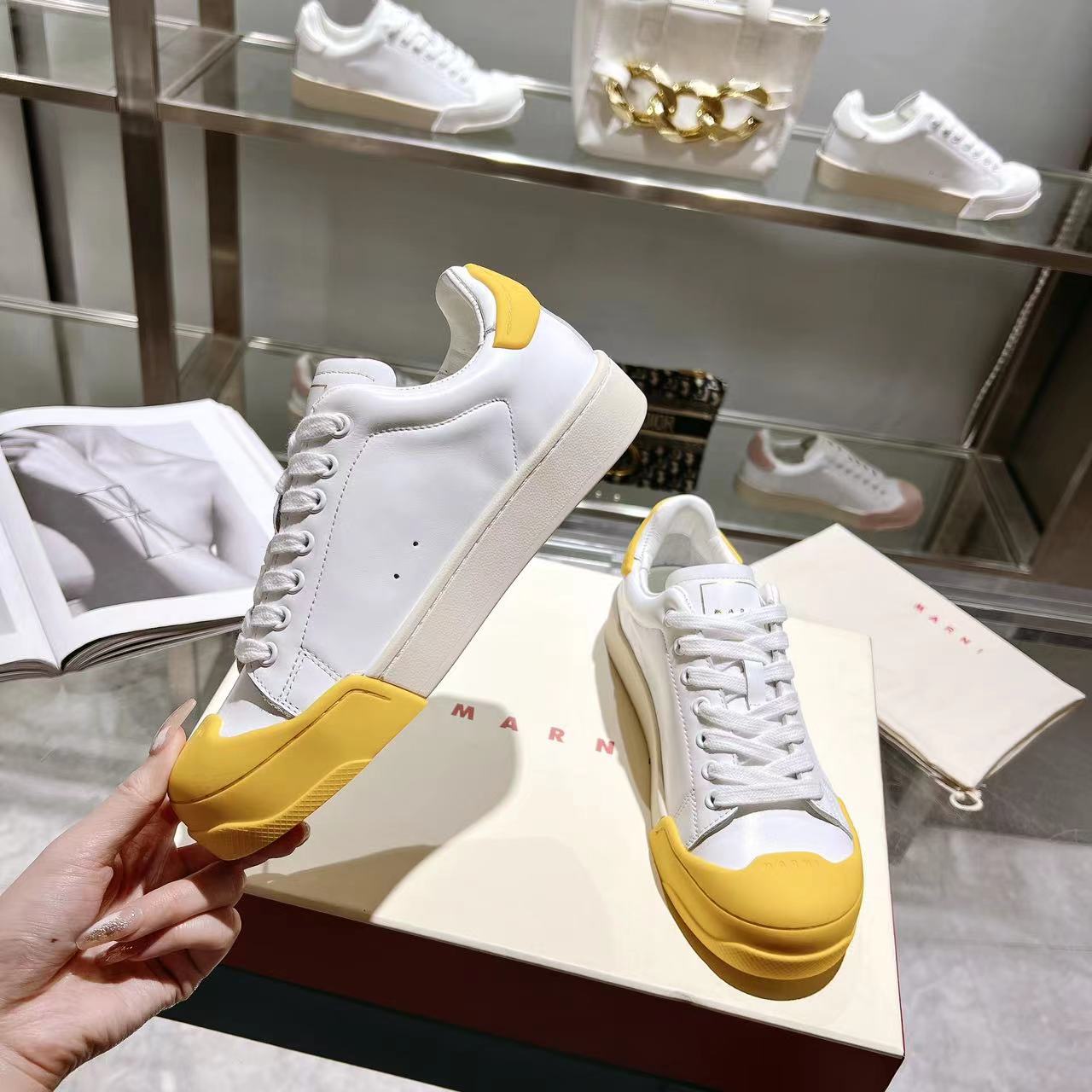 Marni Dada Bumper Sneaker aus weißem und gelbem Leder - EUR FASHION