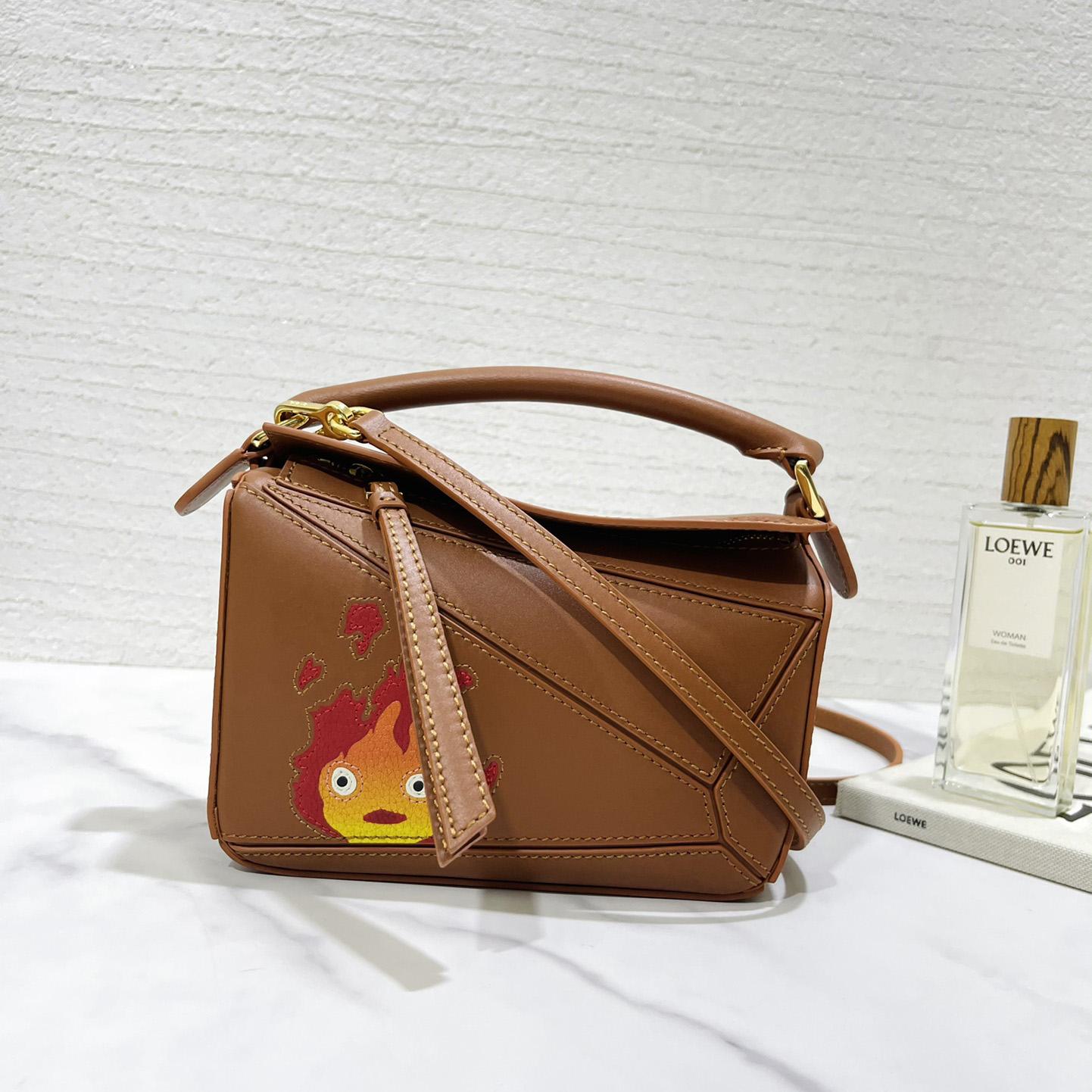 Loewe Calcifer Mini Puzzle-Tasche aus satiniertem Kalbsleder und Kristall - EUR FASHION
