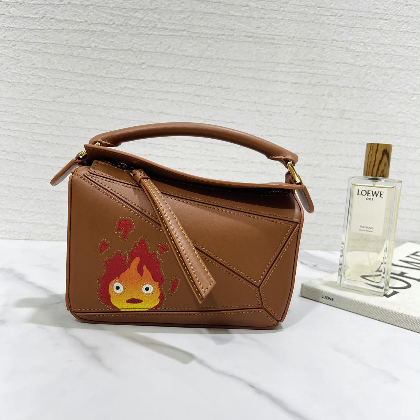 Loewe Calcifer Mini Puzzle-Tasche aus satiniertem Kalbsleder und Kristall - EUR FASHION