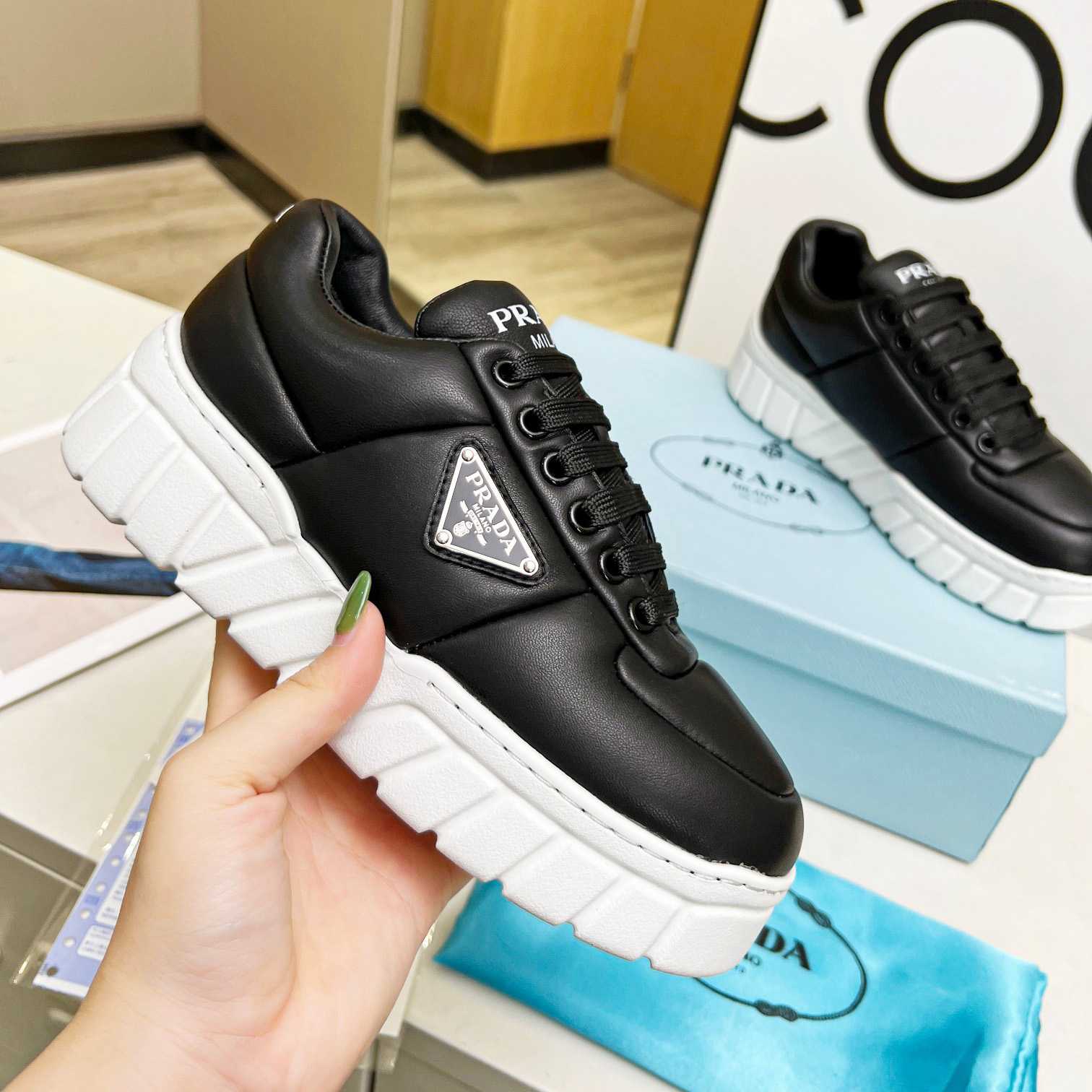 Prada gepolsterte Sneakers aus Nappaleder - EUR FASHION