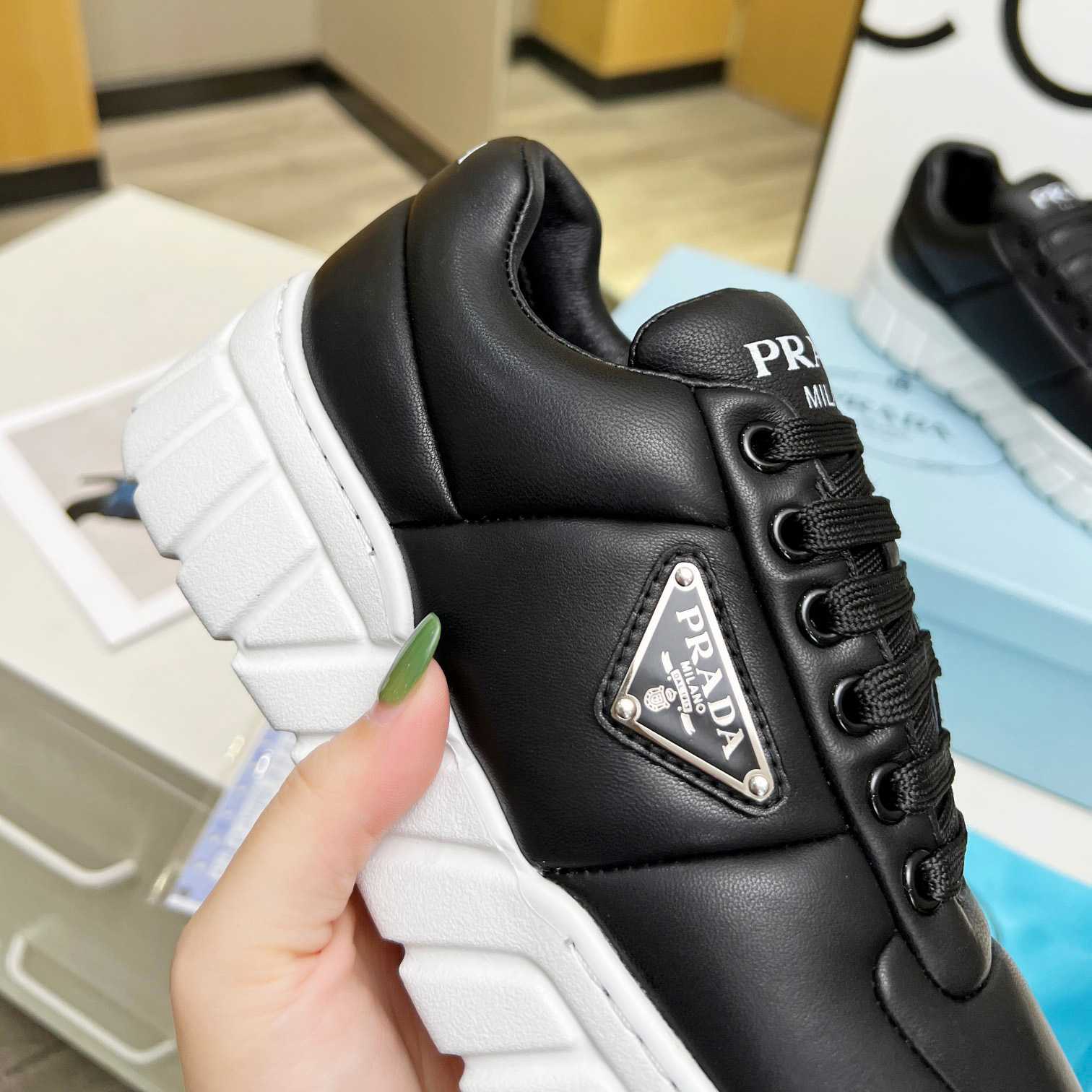 Prada gepolsterte Sneakers aus Nappaleder - EUR FASHION
