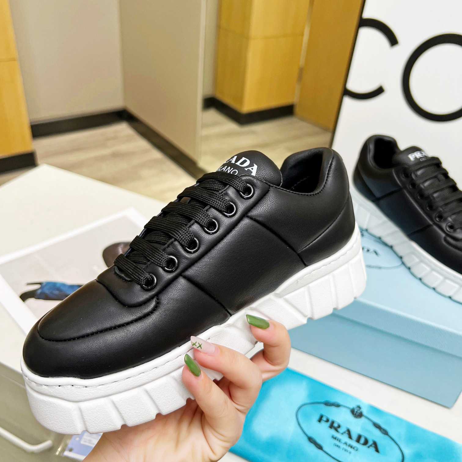 Prada gepolsterte Sneakers aus Nappaleder - EUR FASHION