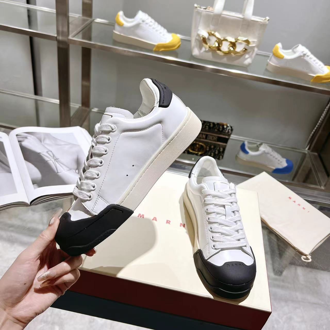Marni Dada Bumper Sneaker aus weißem und schwarzem Leder - EUR FASHION