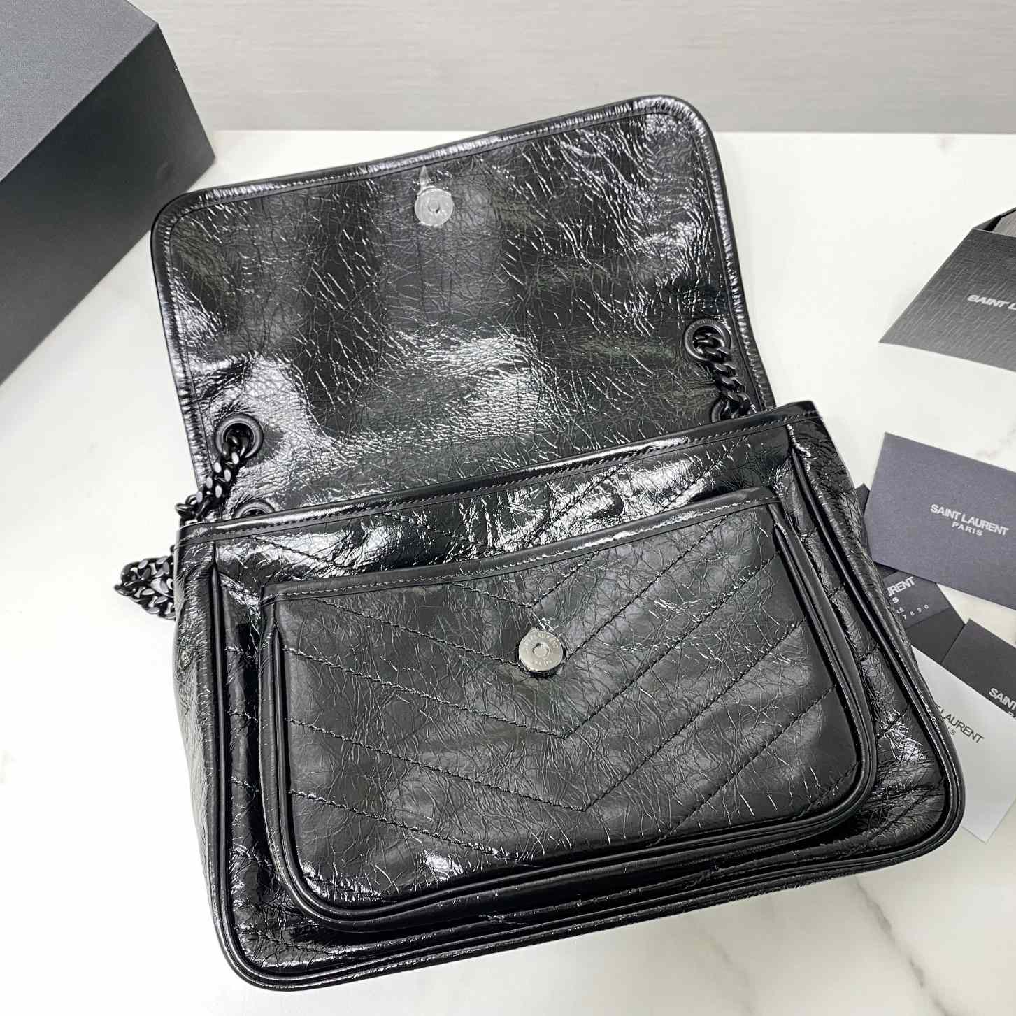 Saint Laurent Niki Mittelgroße Kettentasche aus zerknittertem Vintage-Leder - EUR FASHION