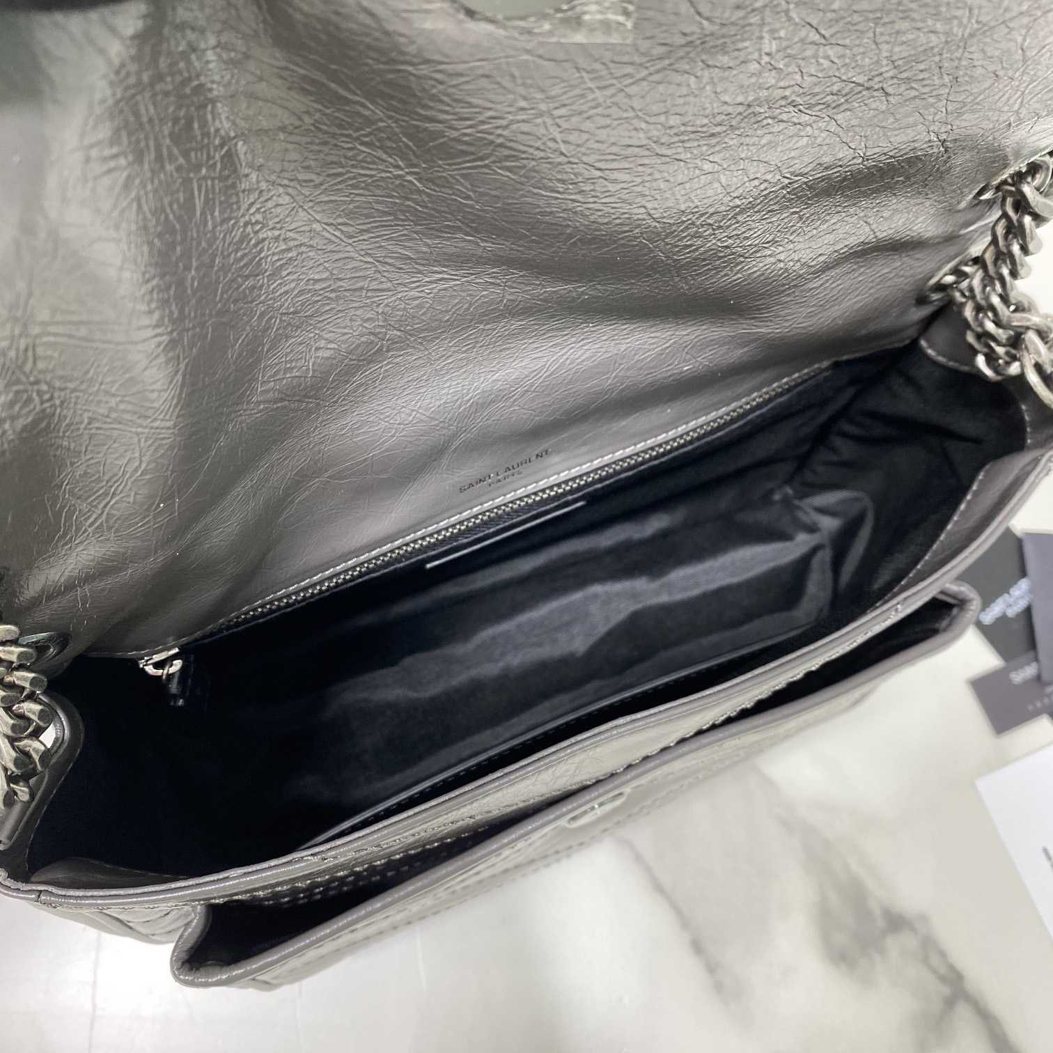 Saint Laurent Niki Mittelgroße Kettentasche aus zerknittertem Vintage-Leder - EUR FASHION
