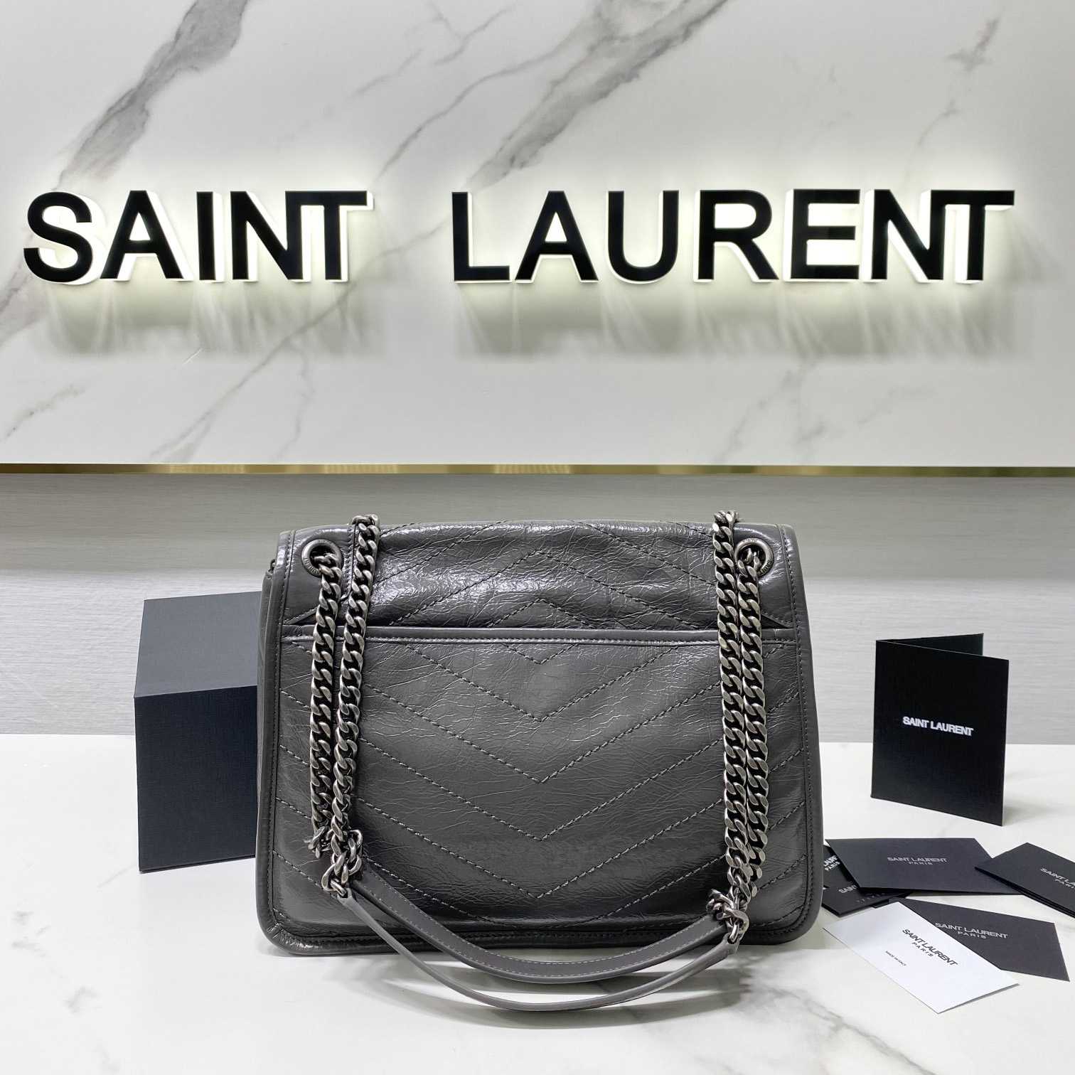 Saint Laurent Niki Mittelgroße Kettentasche aus zerknittertem Vintage-Leder - EUR FASHION