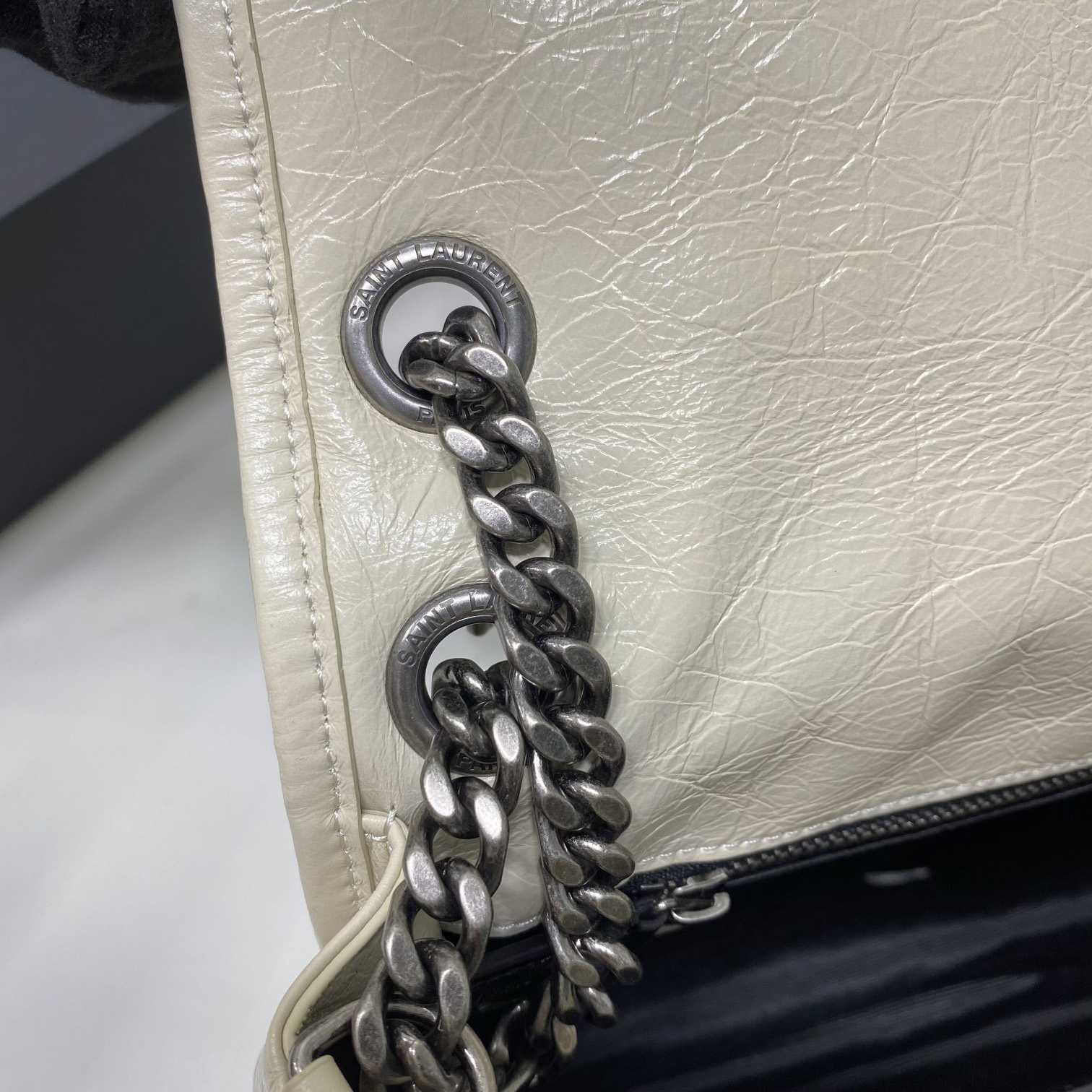 Saint Laurent Niki Mittelgroße Kettentasche aus zerknittertem Vintage-Leder - EUR FASHION