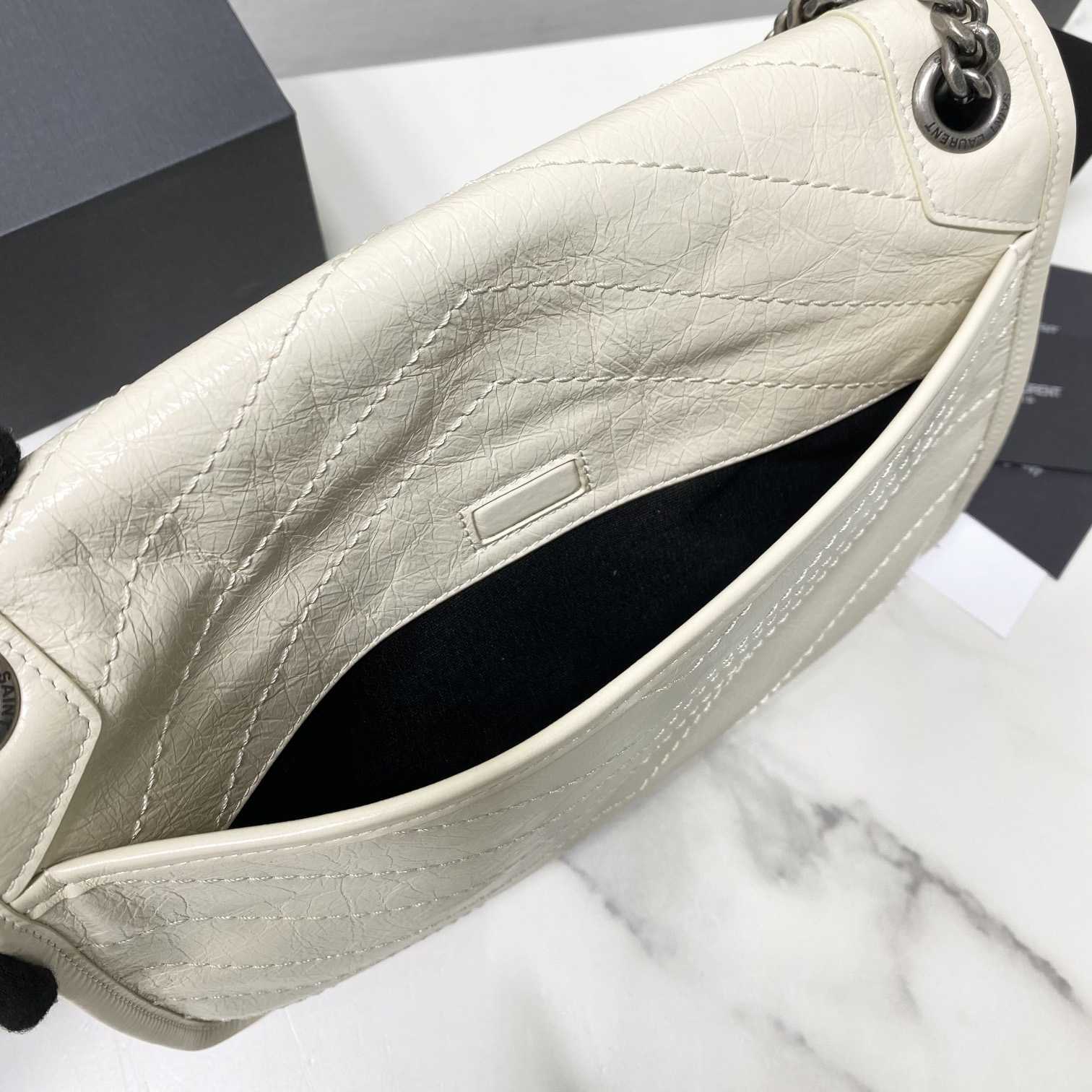 Saint Laurent Niki Mittelgroße Kettentasche aus zerknittertem Vintage-Leder - EUR FASHION