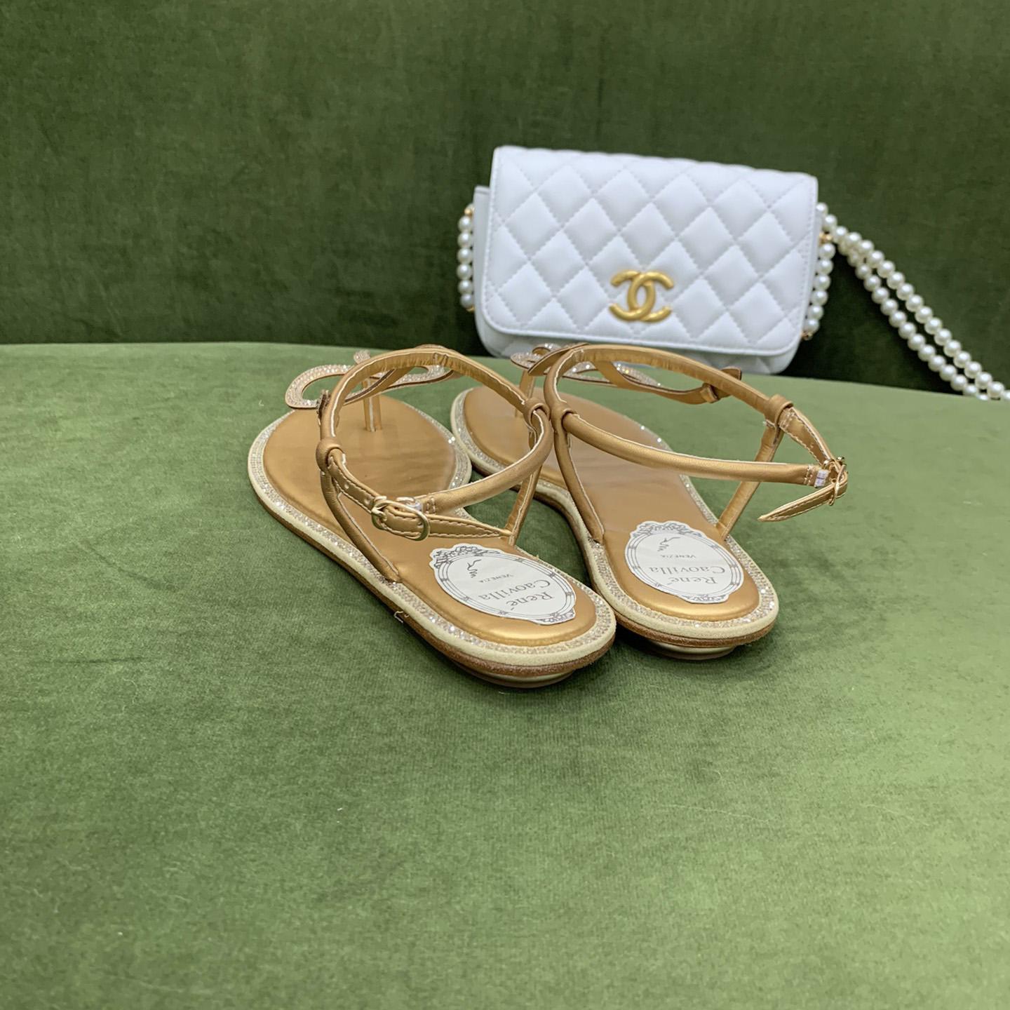 Flache Sandalen mit Schlangenkristallverzierung von Rene Caovilla - EUR FASHION