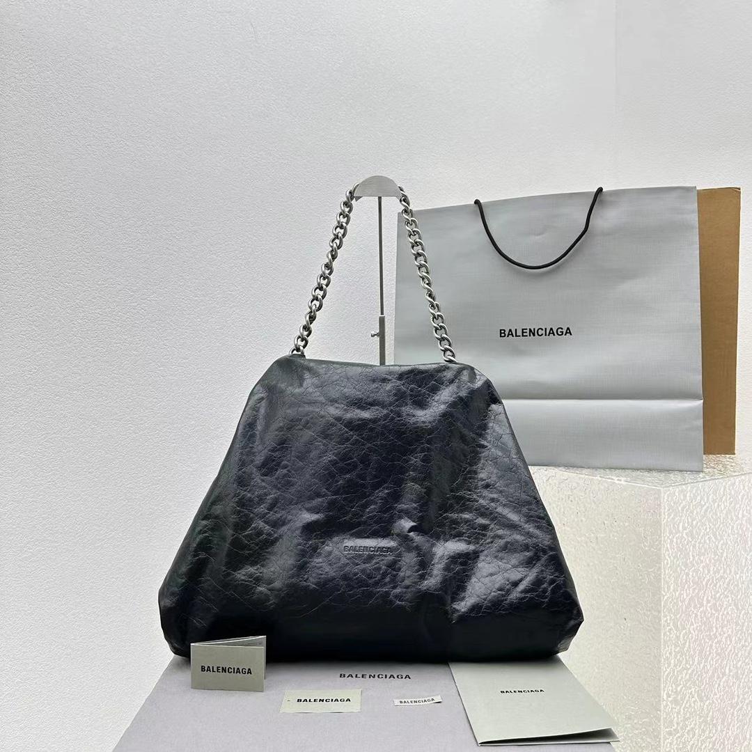 Große Puffer-Tasche von Balenciaga in Schwarz - EUR FASHION