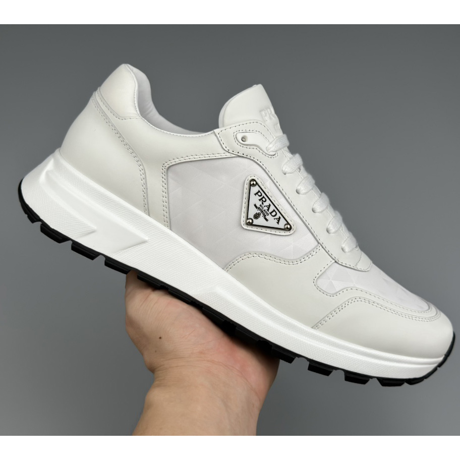 Prada High-Top-Sneakers aus Leder und Re-Nylon - EUR FASHION