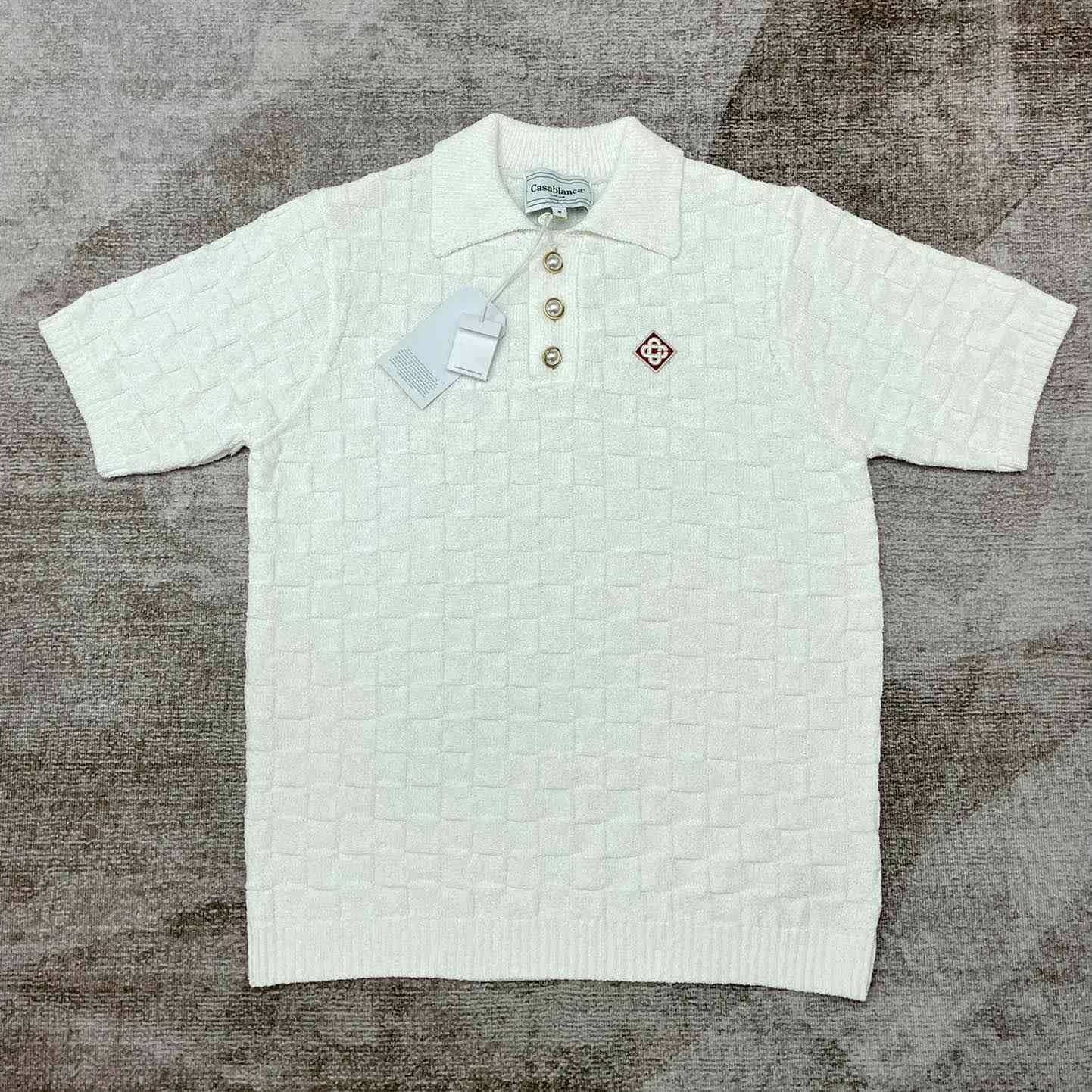 Bouclé-Poloshirt mit Logo-Stickerei von Casablanca<br>
 - EUR FASHION