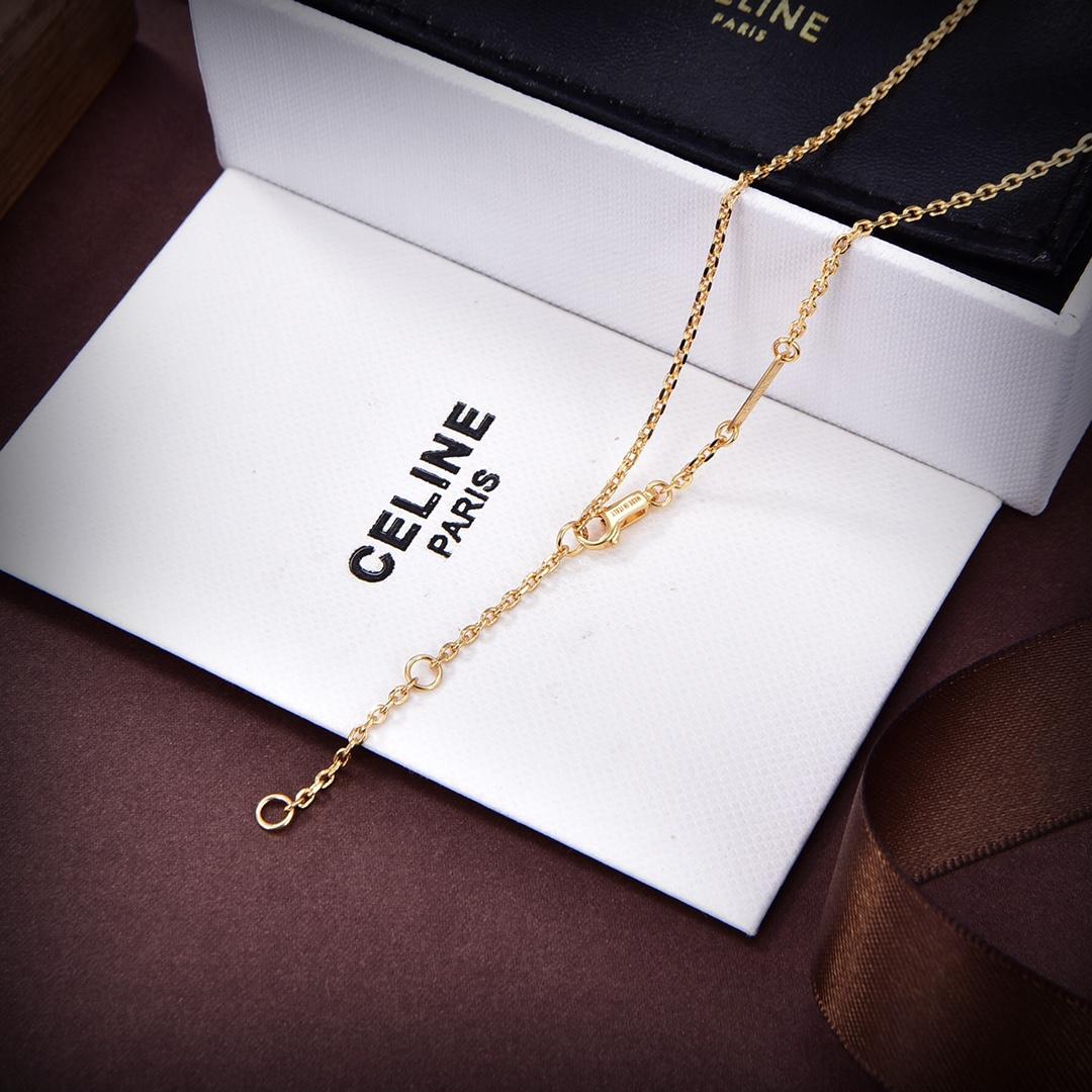 Celine Triomphe Indie Halskette mit kleinen Charms aus Messing mit Goldfinish und Nero Assoluto<br>
 - EUR FASHION