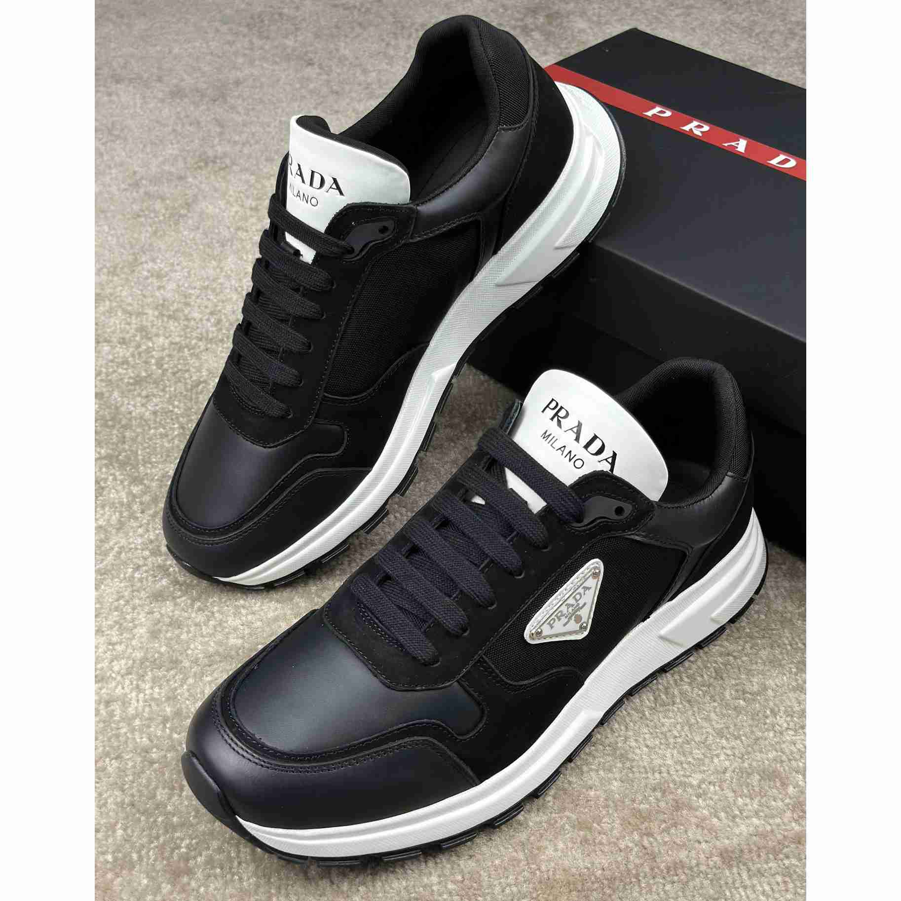 Prada Leather And Re-Nylon Sneakers - EUR FASHION